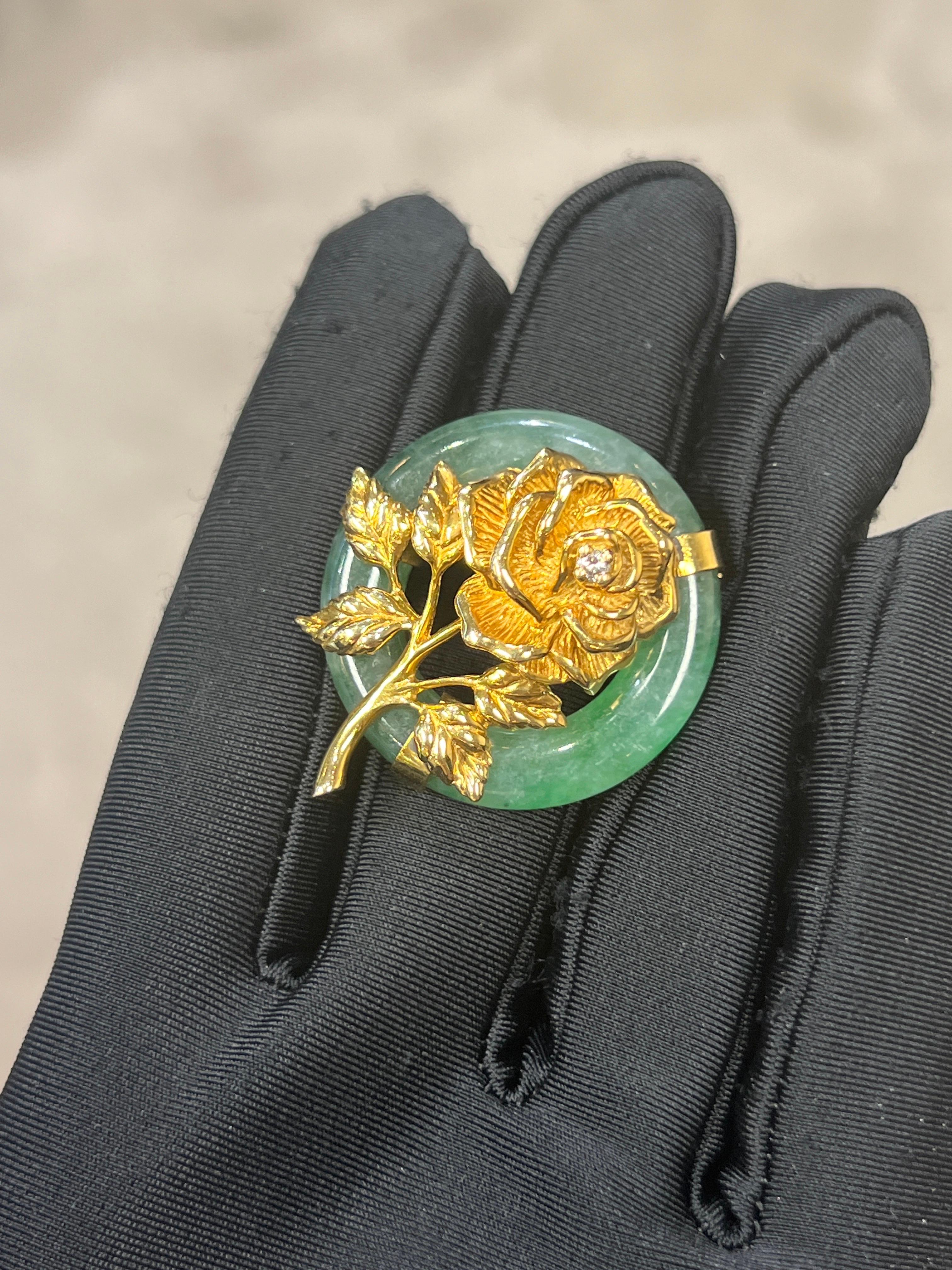 Tiffany & Co Jade Flower Brooch

A round jade brooch with a center rose adorned with a round-cut diamond. 

Approximate Diameter: 1.25