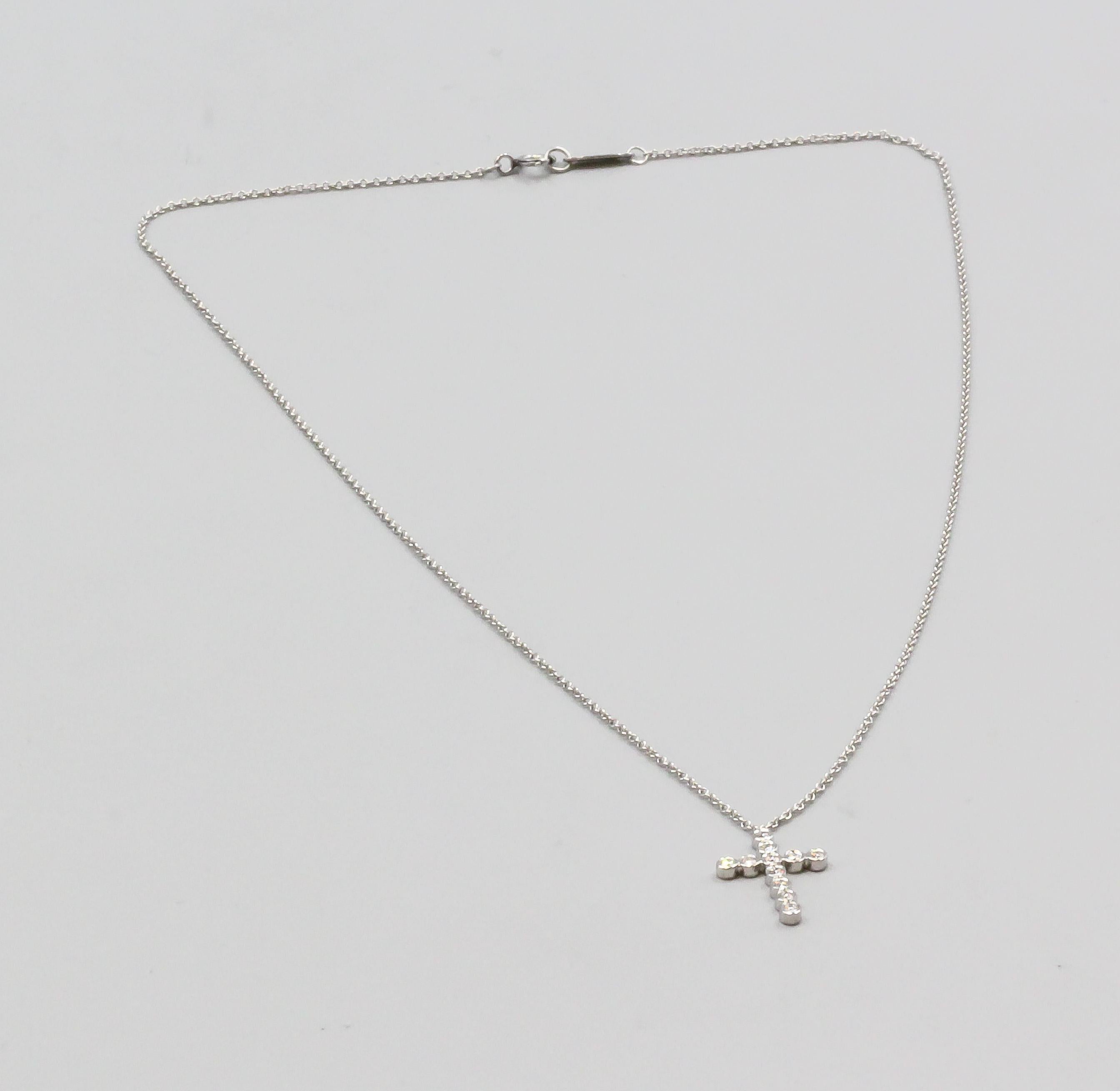 Tiffany & Co. Jazz Bezel Set Diamond Platinum Cross Pendant Necklace In Good Condition In Simpsonville, SC