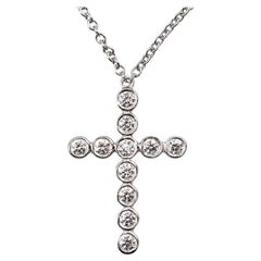 Tiffany & Co. Jazz Bezel Set Diamond Platinum Cross Pendant Necklace