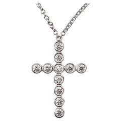 Tiffany & Co. Jazz Bezel Set Diamond Platinum Cross Pendant Necklace