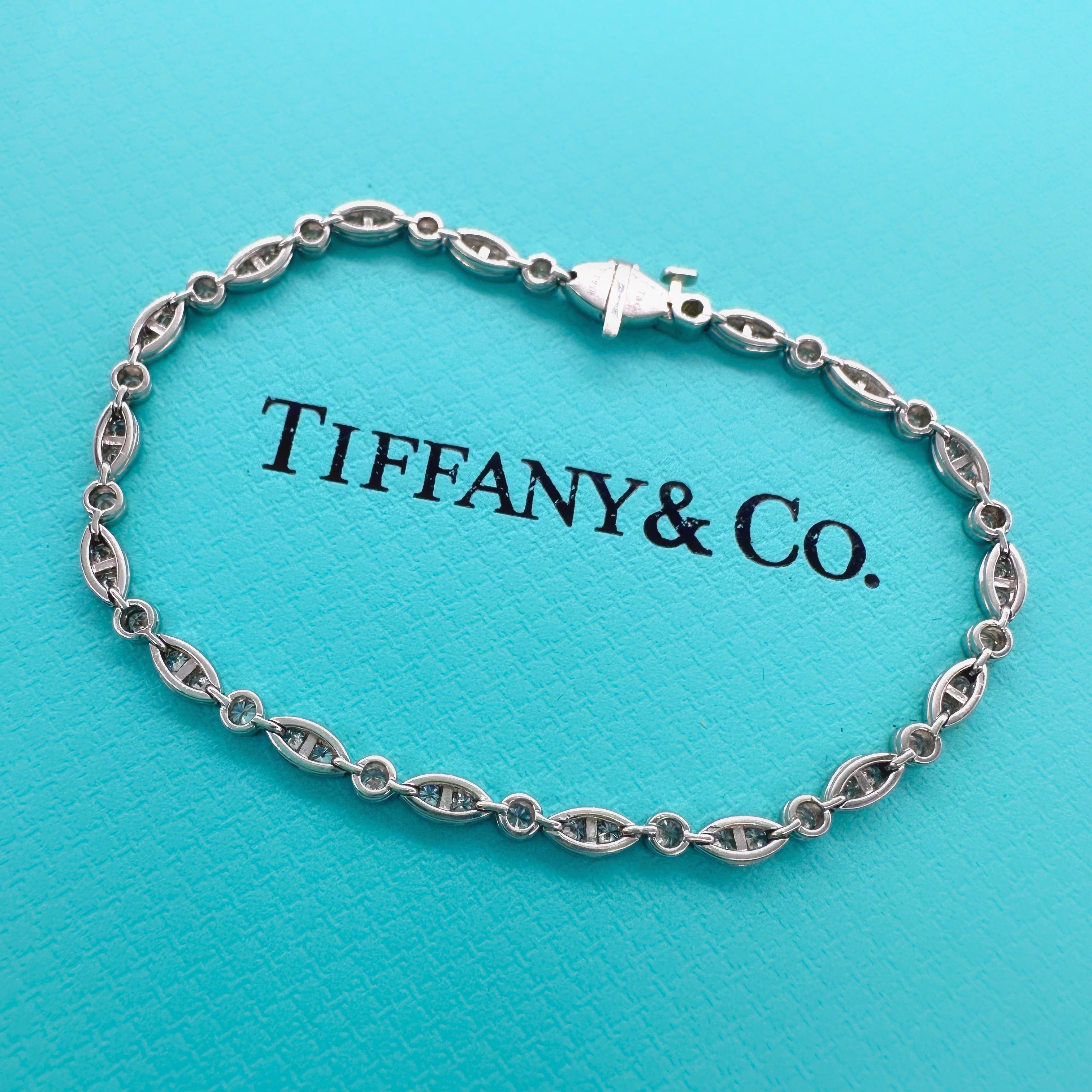 Tiffany & Co. Jazz Diamond Tennis Bracelet in Platinum
Style:  Tennis
Metal:  Platinum PT950
Size:  7' Inches
TCW:  1.60 tcw tcw
Main Diamond:  55 Round Brilliant Diamonds
Hallmark:  ©T&C PT950 on Clasp
Includes:  T&C Bracelet Box - Certified