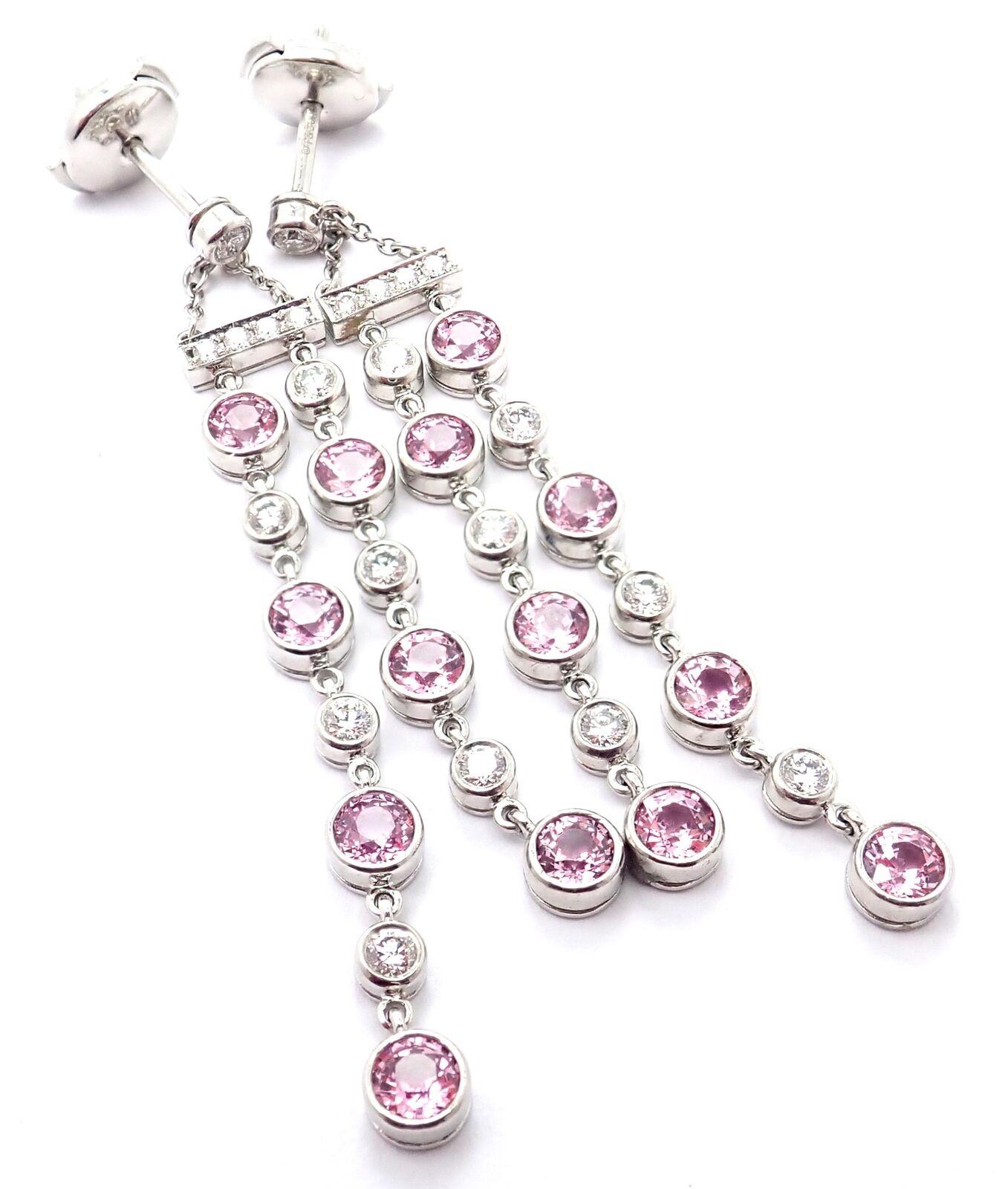 Platinum Jazz Diamond Pink Sapphire Drop Dangle Earrings by Tiffany & Co. 
With 12 round brilliant cut diamonds VS1 clarity, G color total weight approximately .80ct
14 round pink sapphire stones.
These earrings are for pierced ears.
Details: