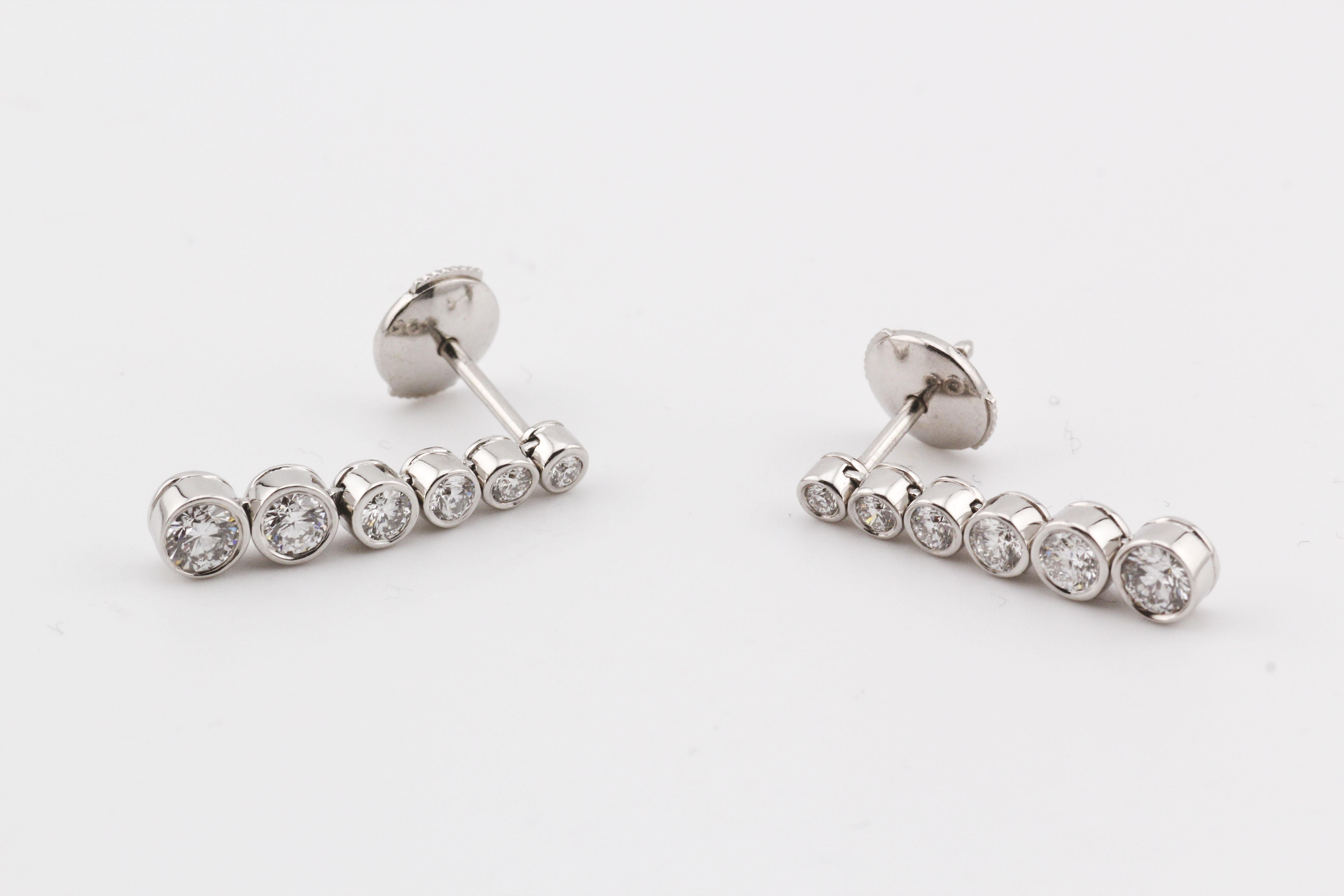 The Tiffany & Co. Jazz Diamond Platinum PT950 Drop Earrings are a breathtaking embodiment of elegance and timeless glamour. Crafted from platinum PT950, these earrings are meticulously designed to exude sophistication, featuring a captivating