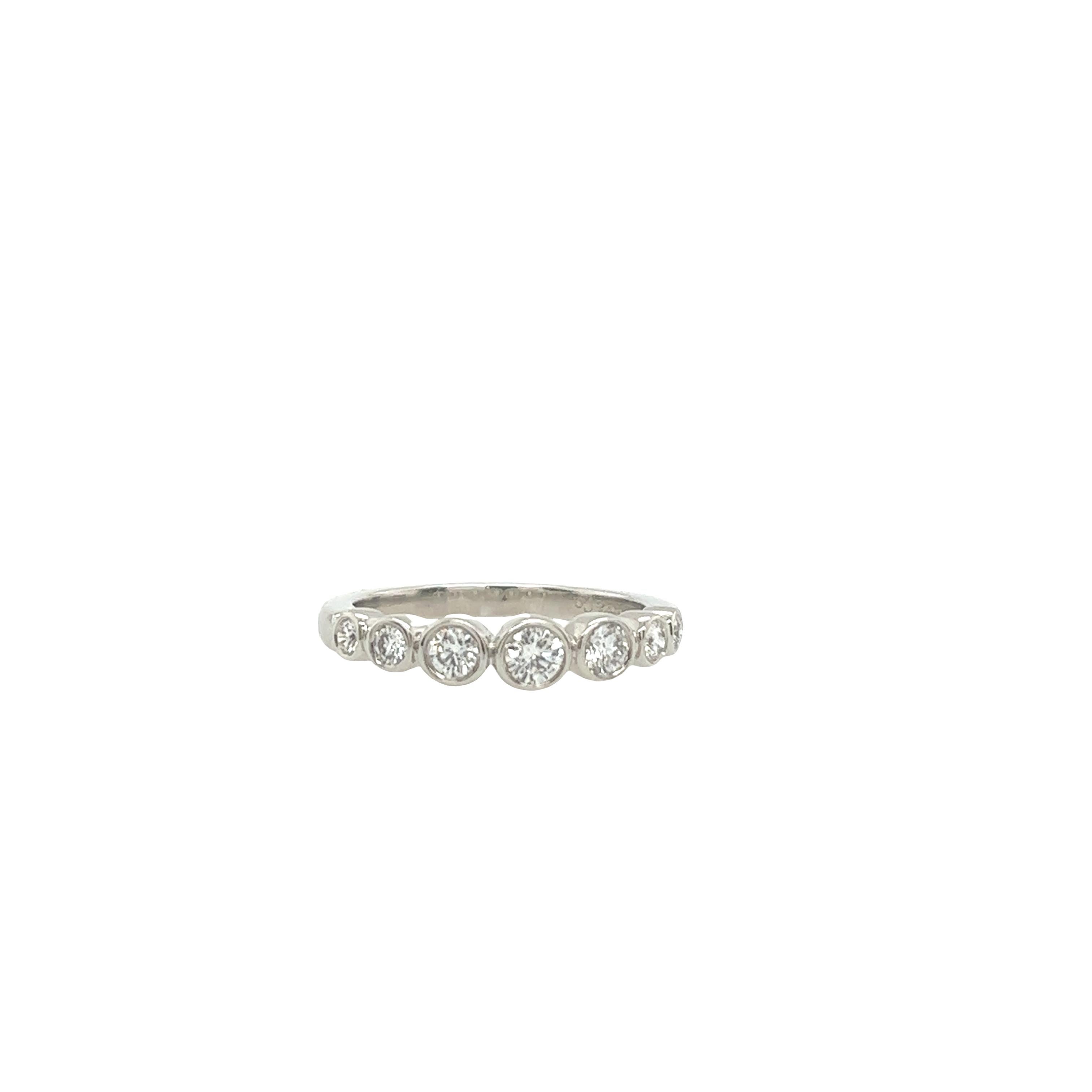 Round Cut Tiffany & Co Jazz Diamond Ring set with 7 stones in a graduated setting in plat For Sale