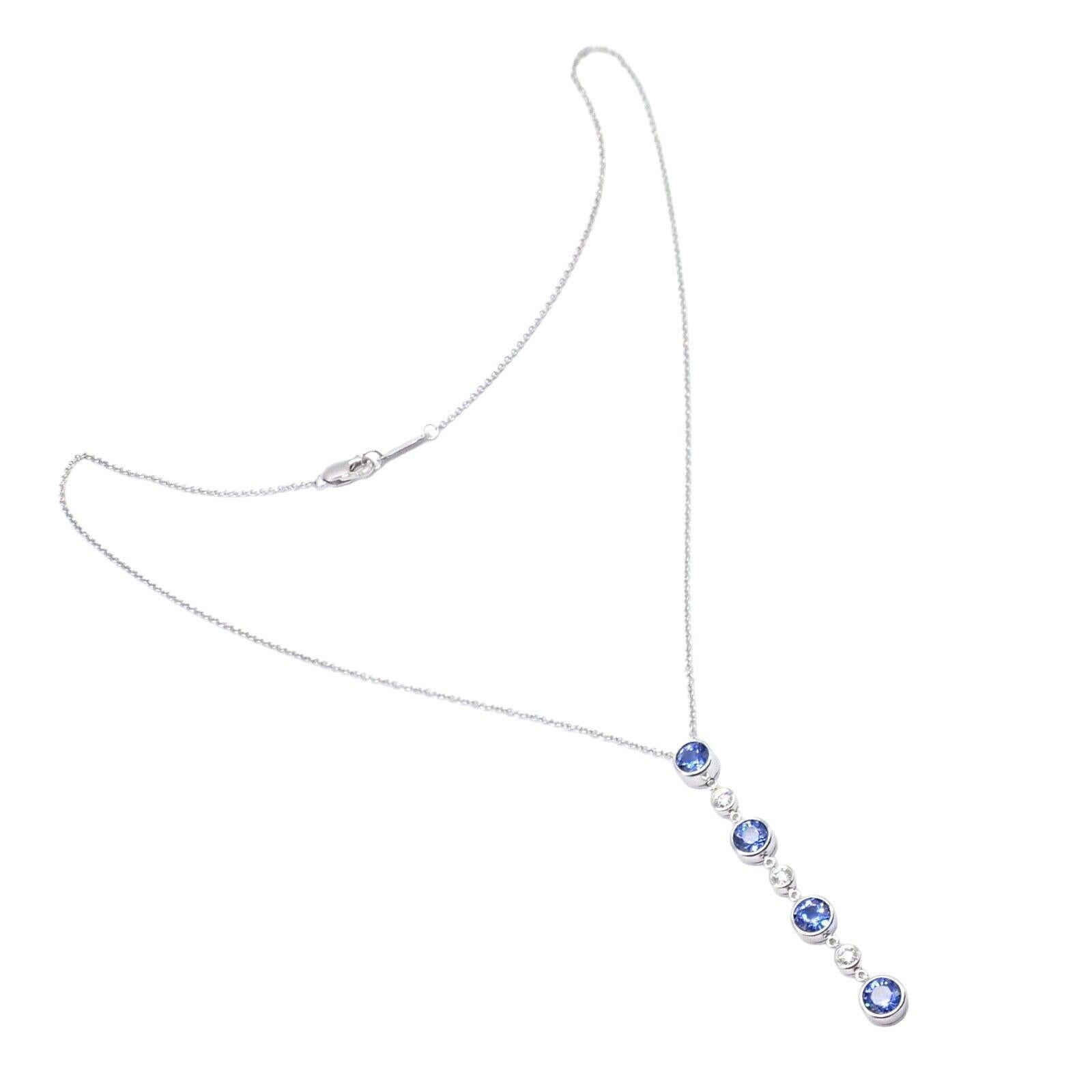 Platinum Diamond Tanzanite Jazz Pendant Necklace by Tiffany & Co.
The Tiffany & Co. Platinum Jazz Diamond Tanzanite Pendant Necklace is an epitome of sophistication. 
This exquisite piece features a striking arrangement of sparkling diamonds and a