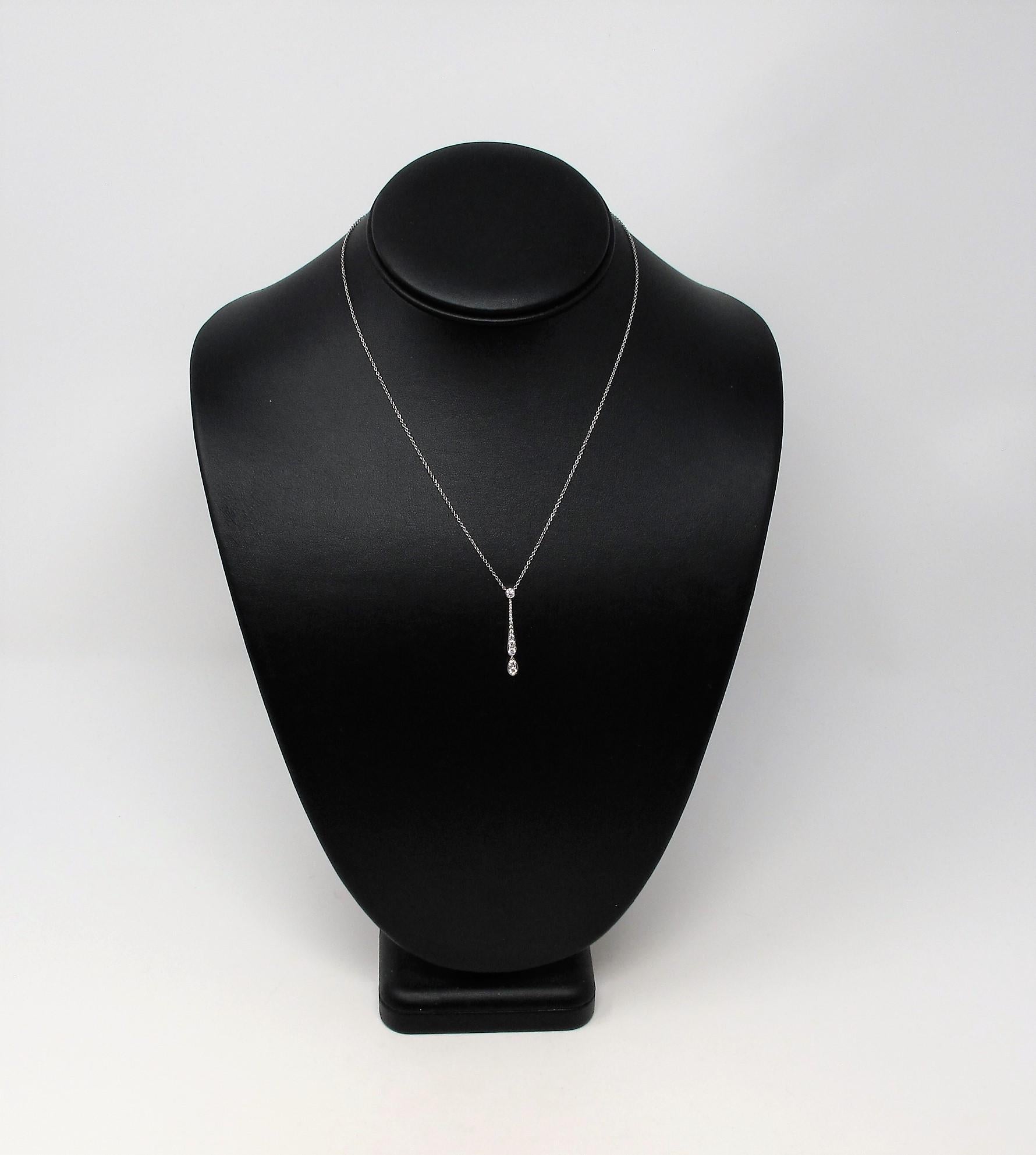 The diamond Jazz pendant necklace from Tiffany & Co. is stunningly simple, yet impressively elegant. This is one of those necklaces that you will never want to take off!  Featuring a delicate platinum chain and a graduated drop of natural round