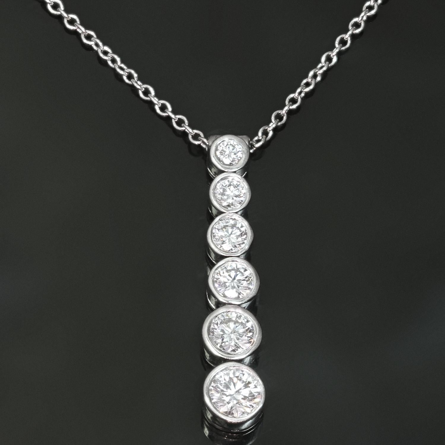This gorgeous necklace from the chic Jazz collection is crafted in platinum and features a graduated drop pendant bezel-set with 6 round brilliant F-G VVS2-VS1 diamonds weighing an estimated 0.45 carats. Made in United States circa 2010s.
