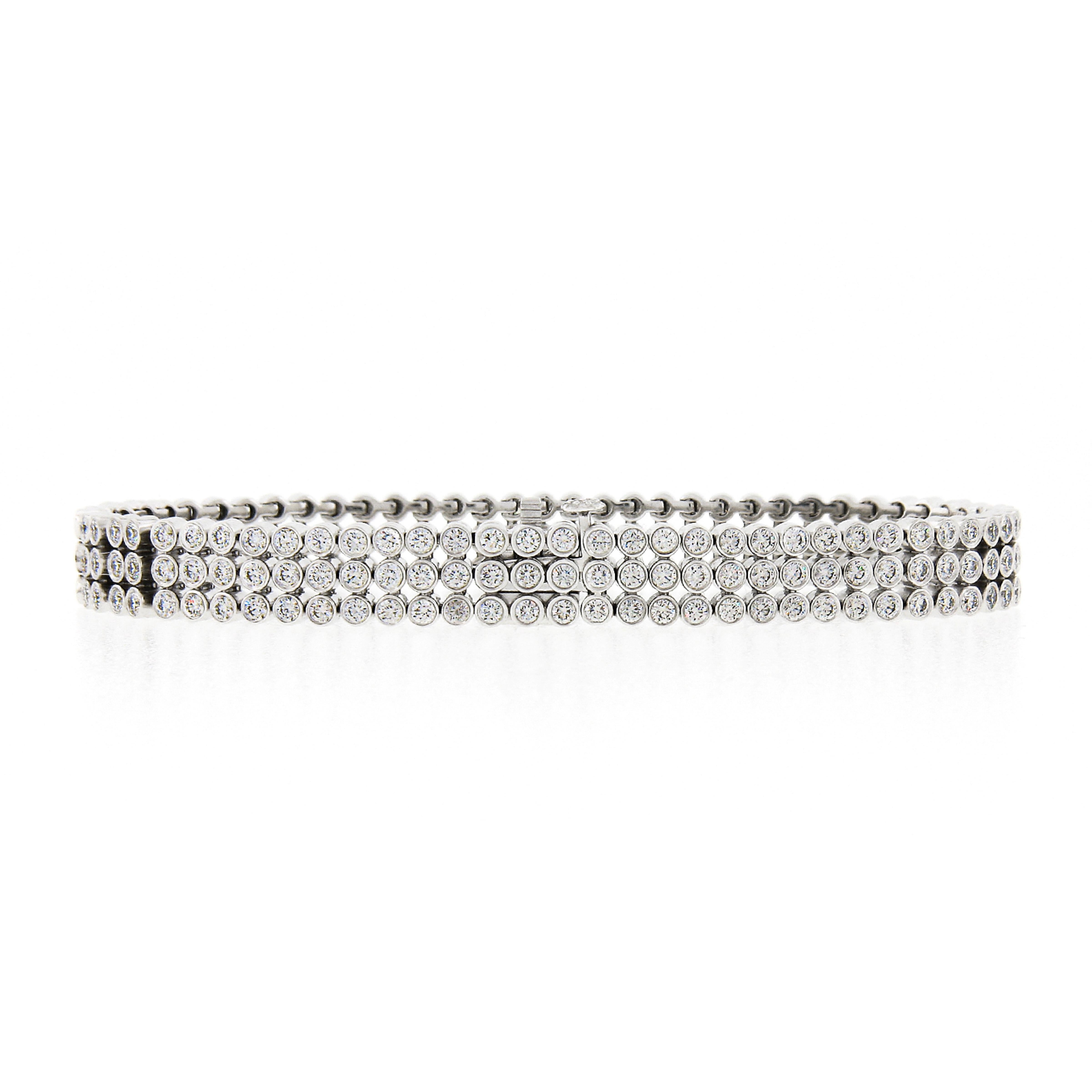 This is a truly breathtaking, fancy, diamond bracelet by Tiffany & Co. that is crafted in solid platinum and features a 3 row design that is neatly bezel set with 204 fiery diamonds throughout. This stunning bracelet comes from the Jazz Collection.