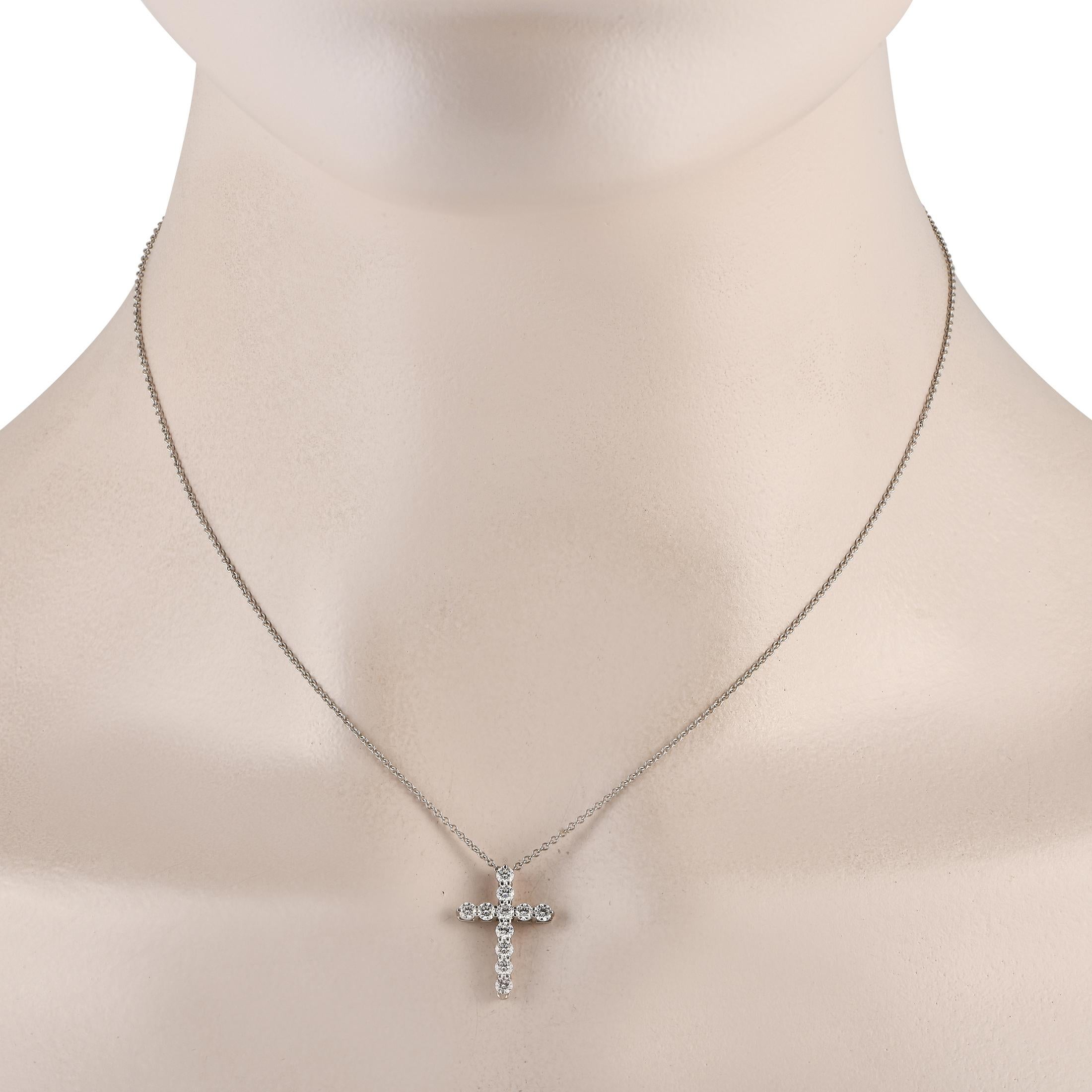 Proudly express your faith with this glittering cross necklace in platinum. From Tiffany & Co's Jazz Collection, this piece features a 0.75