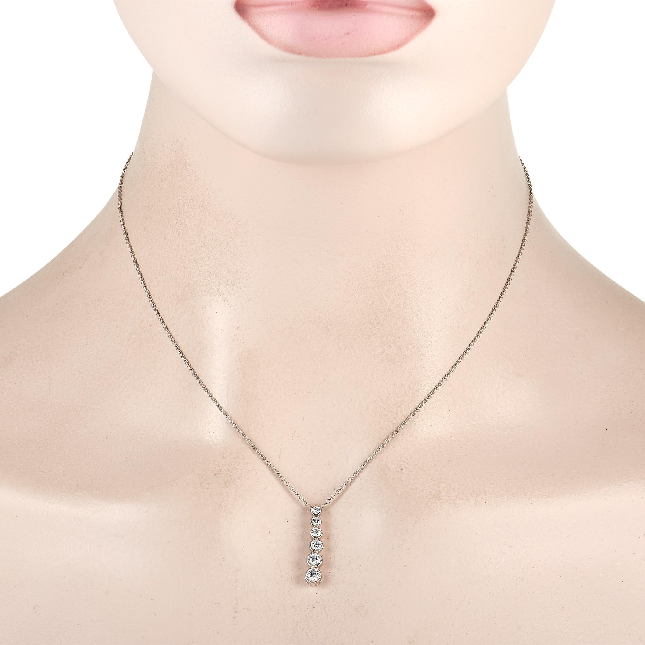 Subtle yet sparkly, you can't go wrong with the timeless appeal of this necklace. The Tiffany & Co. Jazz Platinum 0.70 Diamond Drop Pendant Necklace features a 16-inch long chain holding an approximately 0.15