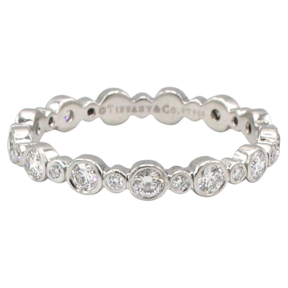 Tiffany & Co. Jazz Platinum Diamond .60 Carat Eternity Band Ring 
Metal: Platinum
Weight: 3.25 grams
Diamonds: Approx. .60 CTW F-G-VS round diamonds
Size: 8 (US)
Width: 3mm
Height: 1.7mm
Signed: Tiffany & Co. PT950
