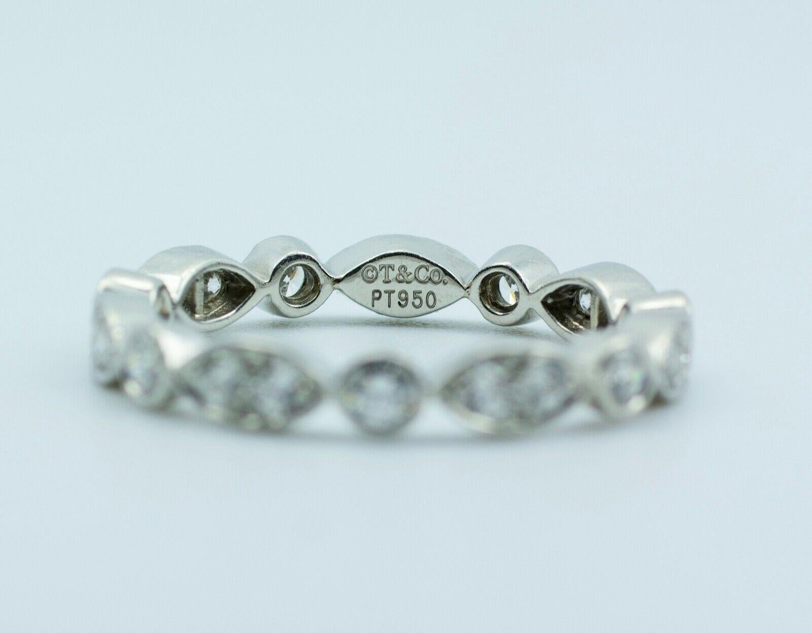 Tiffany & Co Platinum Round Diamond Eternity Band
Ring Size 6.75
3.8 Grams
 White Round Brilliant Cut Diamonds 0.61 Carats Total Weight
Color: F
Clarity: VS2

This is a beautiful Tiffany & Co. diamond band that shows off these round diamonds. It is