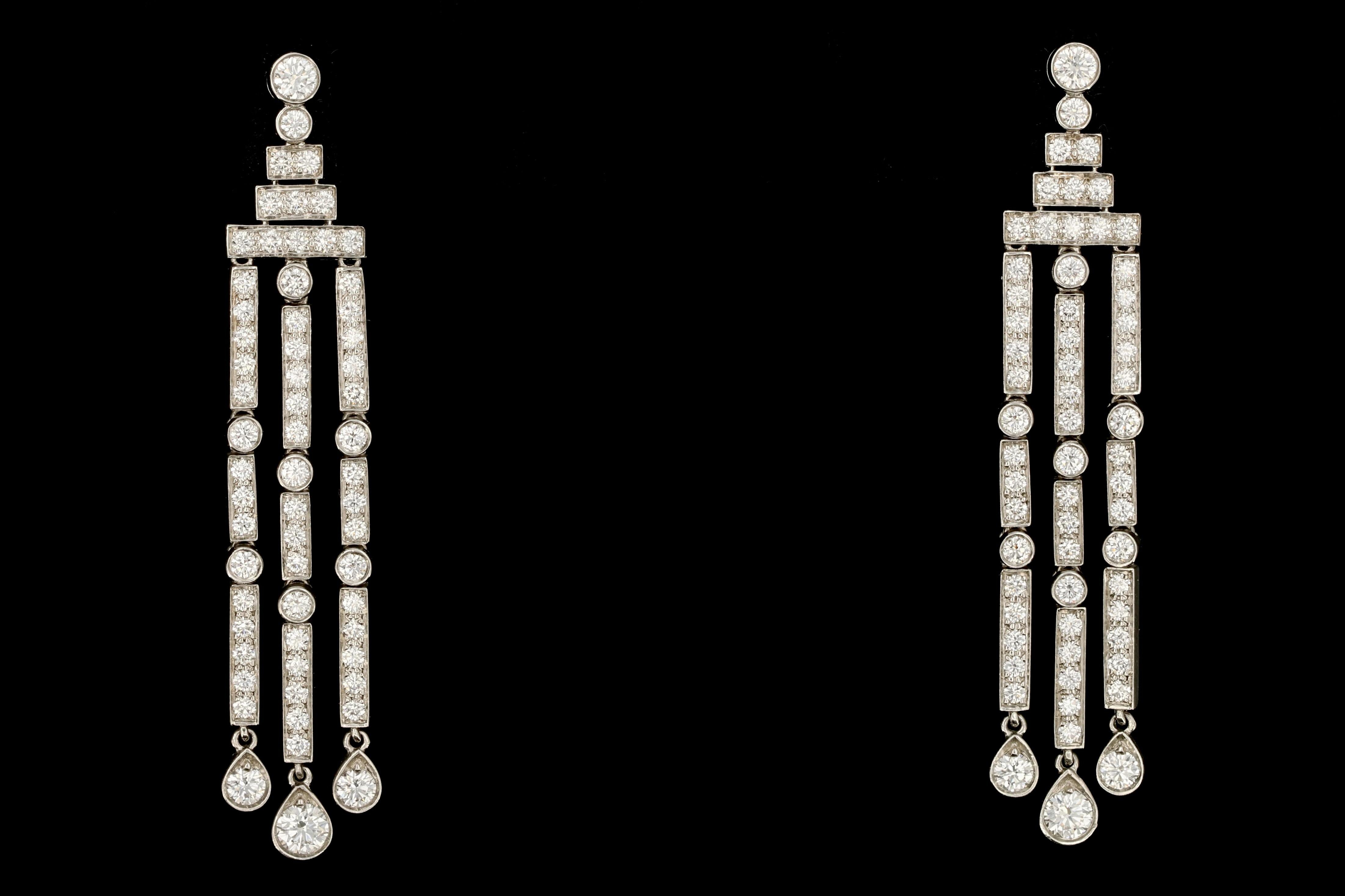 Era: c.2013

Hallmarks: Tiffany & Co PT 950 on earrings and backs

Composition: 95% Platinum

Primary Stone: Diamonds

Stone Carat: 2.15 carats total

Earring Measurements: 2
