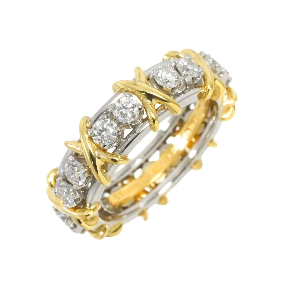 TIFFANY & Co. Jean Schlumberger Anello X in oro 18 carati con sedici pietre e diamante 6,5

Sixteen Stone by Tiffany è un'espressione delle forze nutritive dell'amore. Ideato dal leggendario stilista Jean Schlumberger nel 1959, il motivo del punto