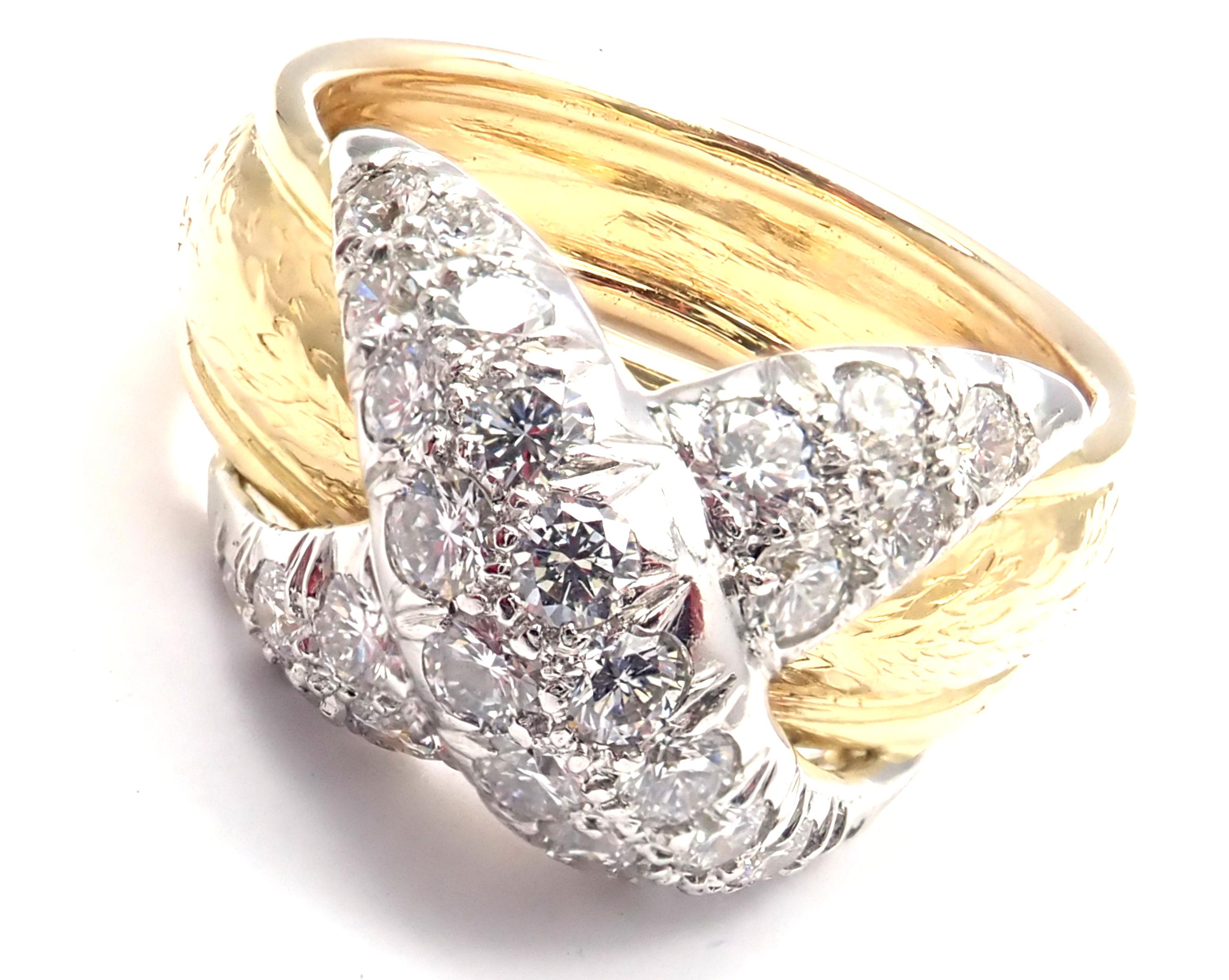 18k Yellow Gold Diamond X Band Ring by Jean Schlumberger for Tiffany & Co. 
With 28 Round Brilliant Cut Diamonds VS1 clarity, G color, 
Total weight Approx 1ct
Details:
Ring Size: 5.5
Weight: 9.5 grams
Width: 11.5mm
Stamped Hallmarks: Tiffany & Co