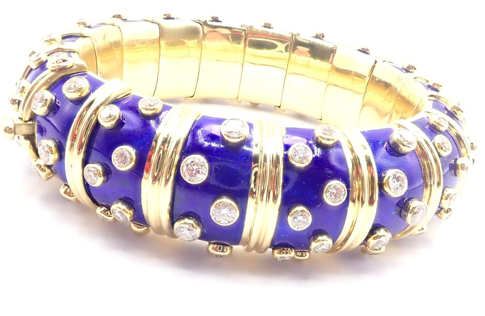 18k Yellow Gold Diamond TIFFANY & Co Jean Schlumberger Paillone Blue Enamel Bangle Bracelet.
With 108 Round Brilliant Cut diamonds VS1 clarity, G color total weight approximately 6ct.
Beautiful Blue Color Paillonne Enamel
Measurements:
Length: Fits