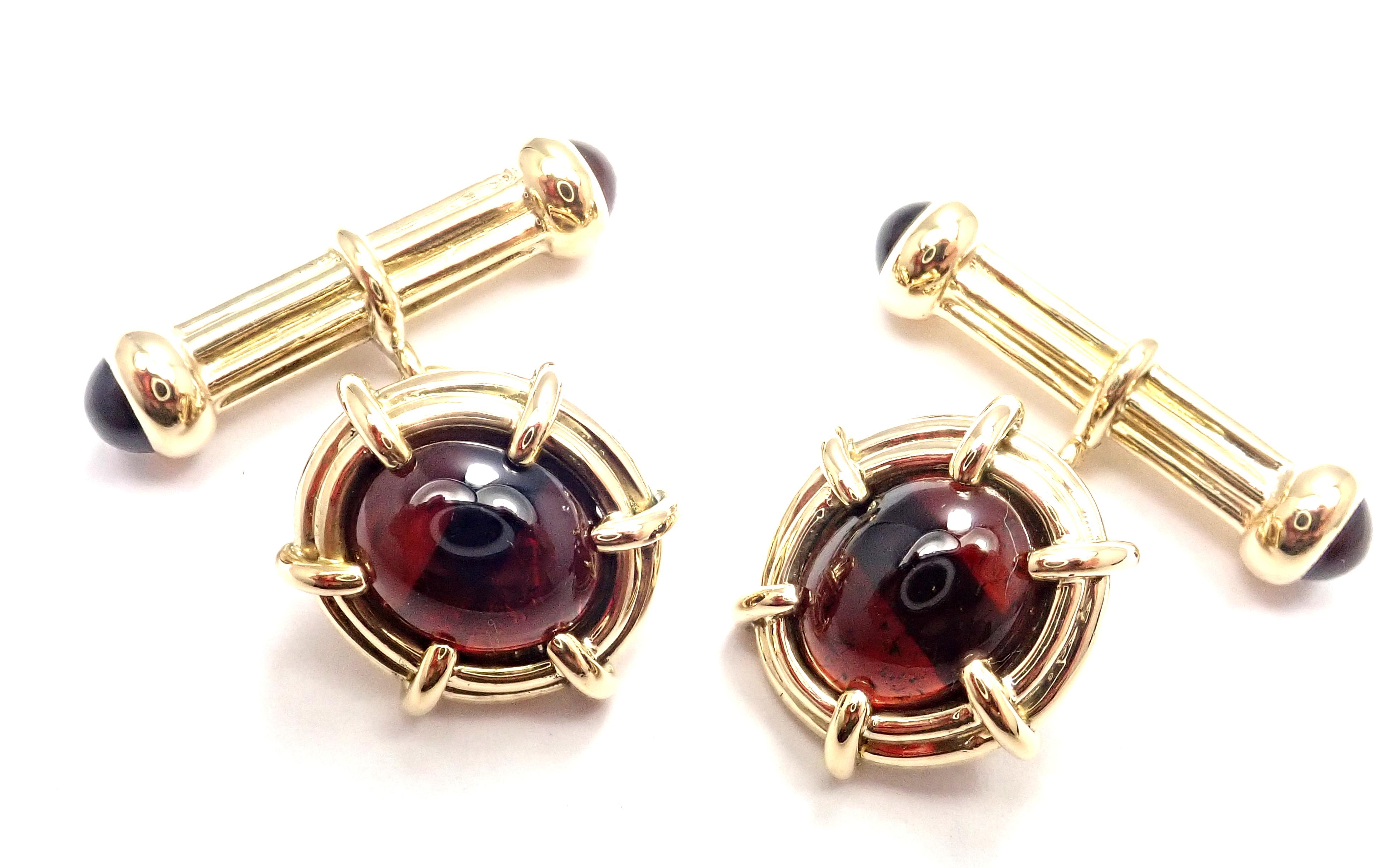 18k Yellow Gold Garnet Cufflinks by Jean Schlumberger for Tiffany Co. 
With 6 cabochon garnet stones
two larger garnets are 12mm x 11mm
Details: 
Measurements: 28mm x 19mm x 19mm
Weight: 22.5 grams
Stamped Hallmarks: Tiffany & Co Schlumberger