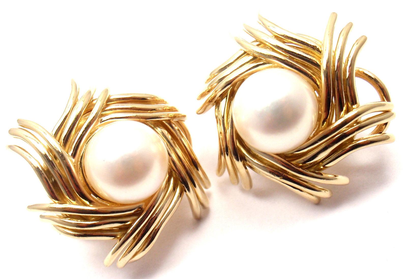 18k Yellow Gold Pearl by Jean Schlumberger Earrings for Tiffany & Co. 
With two 9mm cultured pearls. 
These earrings are for pierced ears.

Details: 
Length: 23mm
Width: 22mm
Weight: 22.5 grams
Stamped Hallmarks: Tiffany & Co Schlumberger 750
*Free