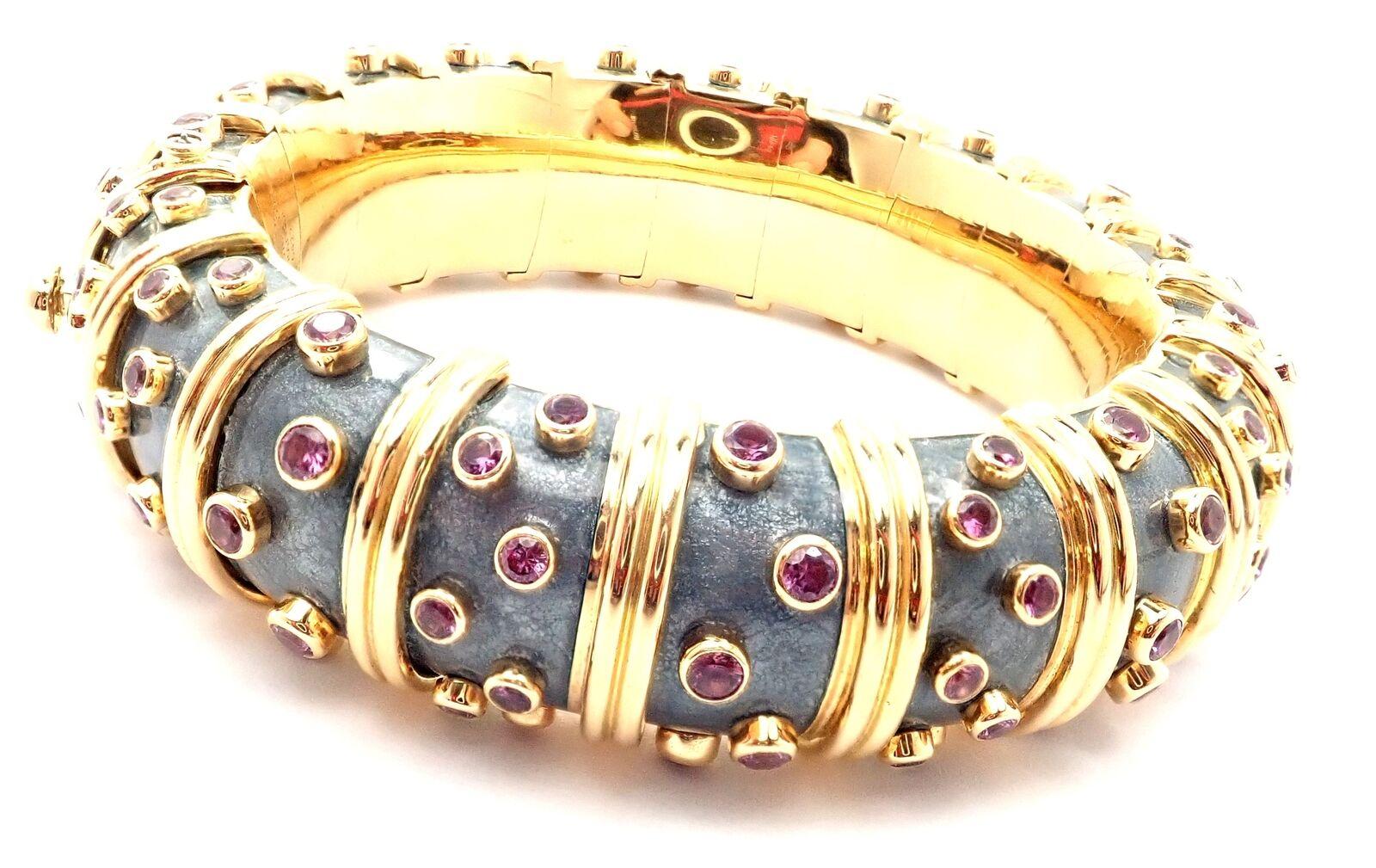 18k Yellow Gold Pink Sapphire PAILLONE Slate Grey Enamel Wide Bangle Bracelet by JEAN SCHLUMBERGER For TIFFANY & Co.
With 108 Round Brilliant Cut pink sapphires total weight approximately 8ct.
This bracelet comes with Tiffany & Co.
