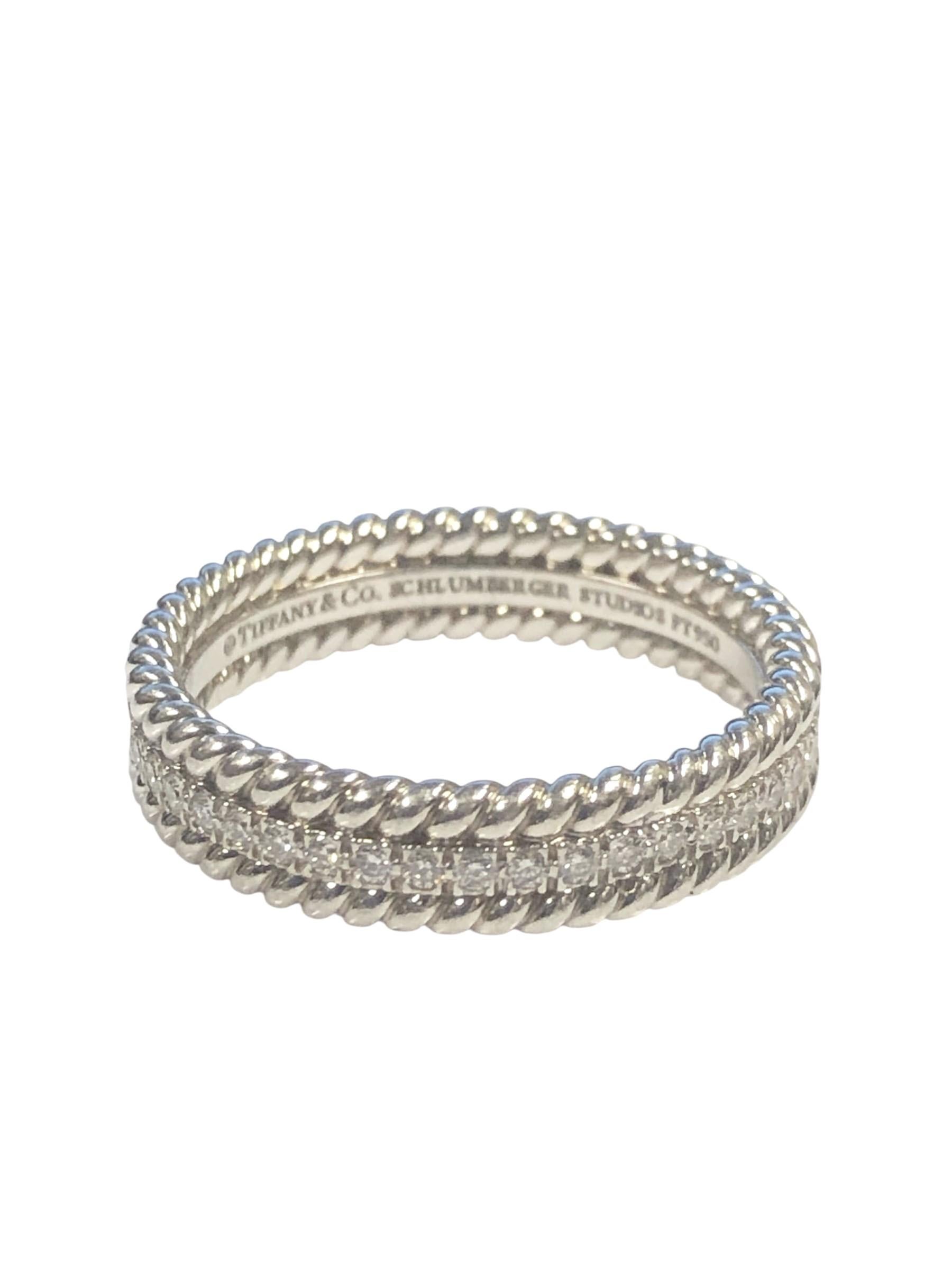 Circa 2018 Jean Schlumberger for Tiffany & Company Platinum and Diamond Stacking Band Ring. measuring 4.5 M.M wide and having Rope Borders, set with Round Brilliant cut Diamonds totaling .60 Carat. Finger size 7. Comes in the original Tiffany
