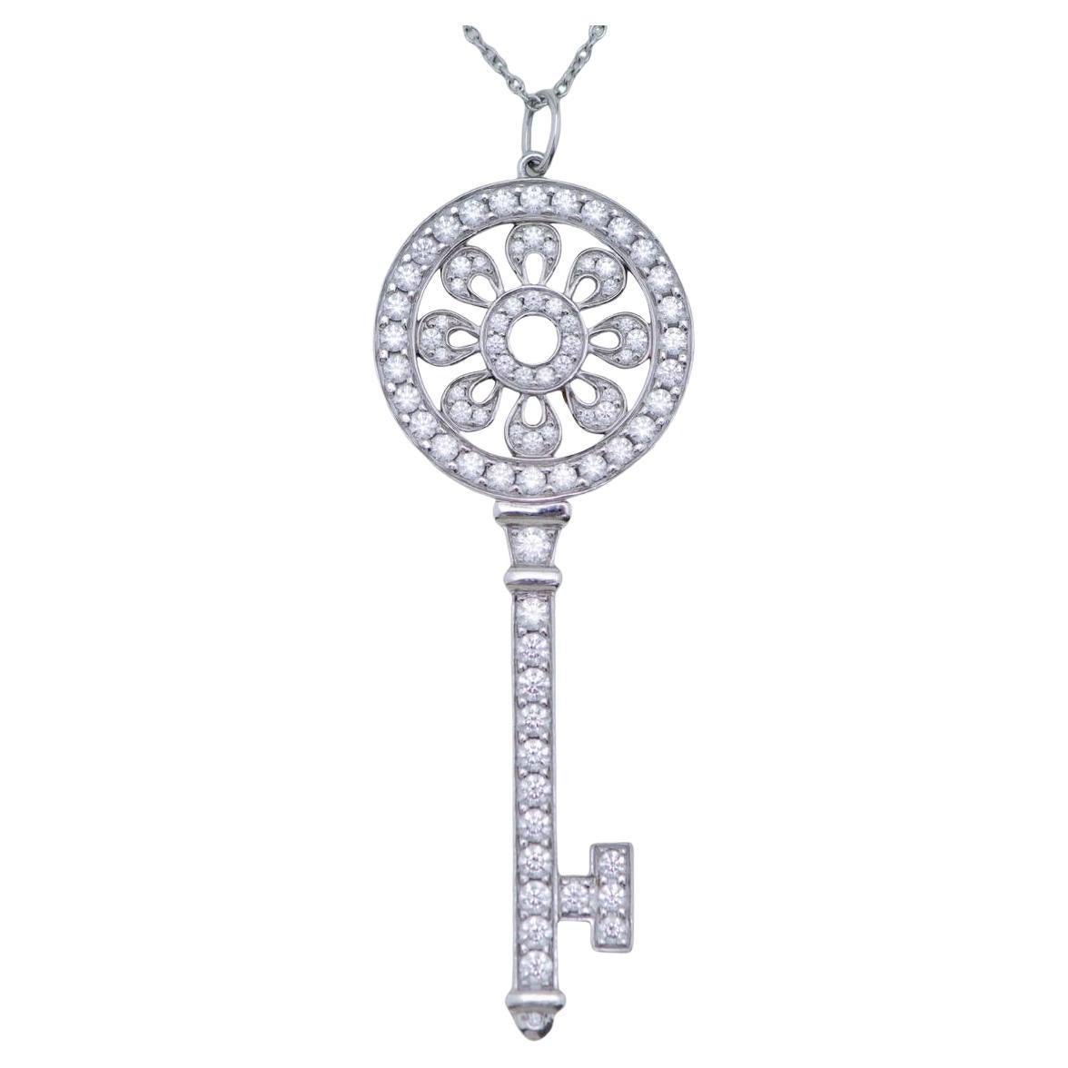 Tiffany 
Co. Keys Petals Diamond Platinum Key Pendant Necklace