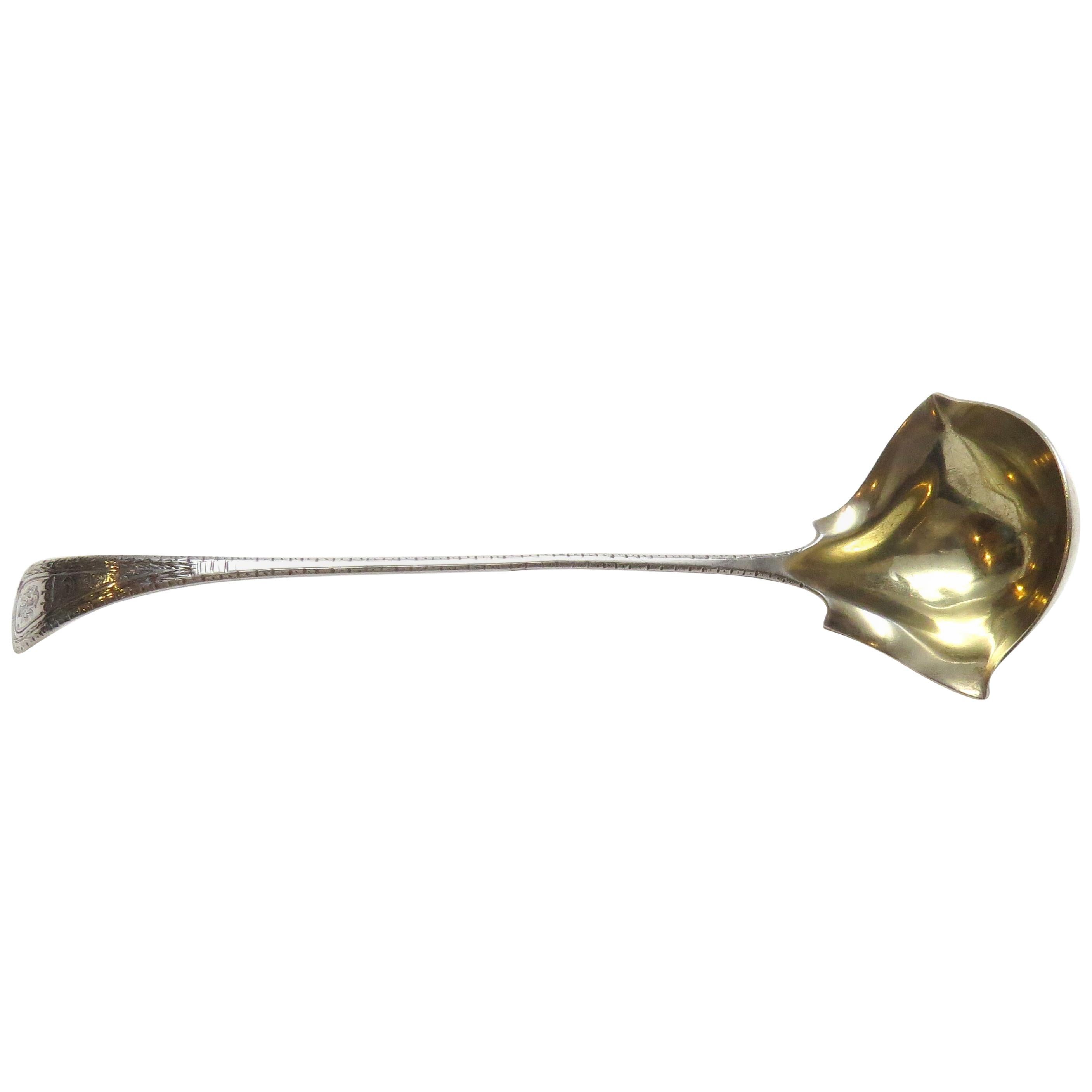 Tiffany & Co. Cucharón para nata de doble labio King William de plata de ley grabada