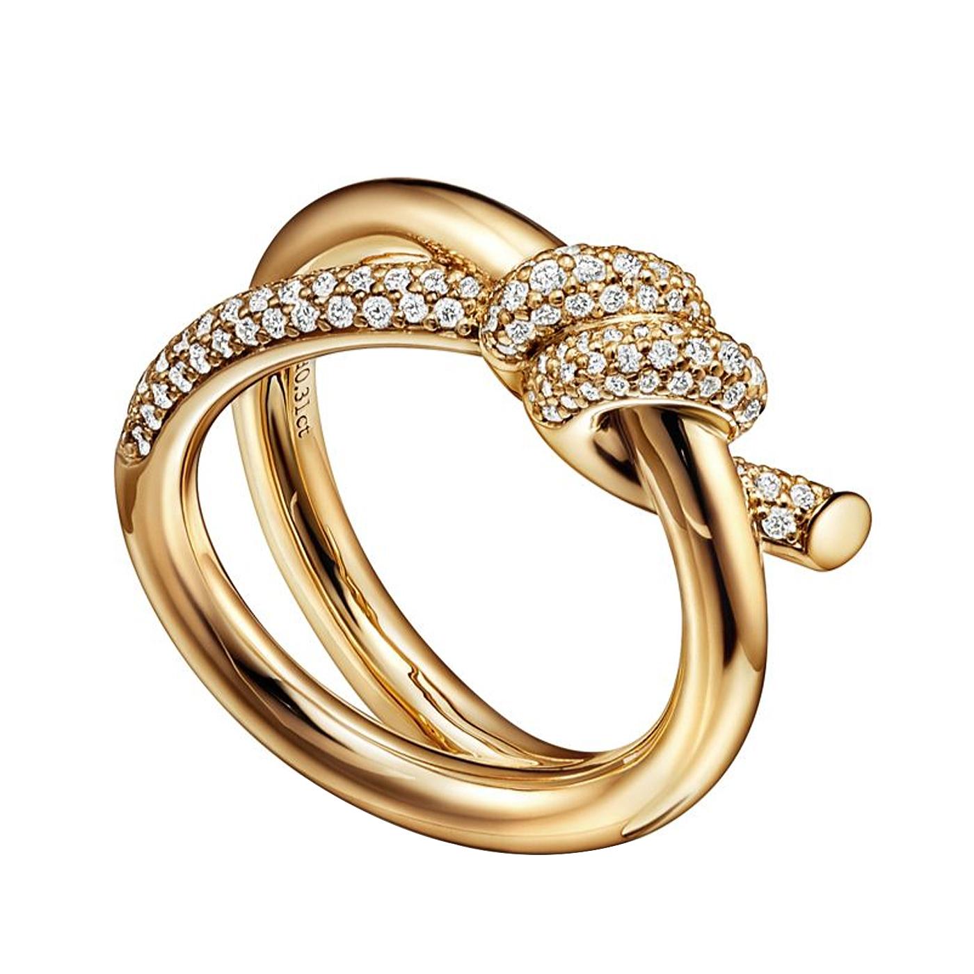 Tiffany Knot is an expression of love’s unwavering bonds. Inspired by an archival bow crafted in 1889, Knot is a symbol of life’s most enduring ties and meaningful connections. This ring is crafted with yellow gold and pavé diamonds, then polished