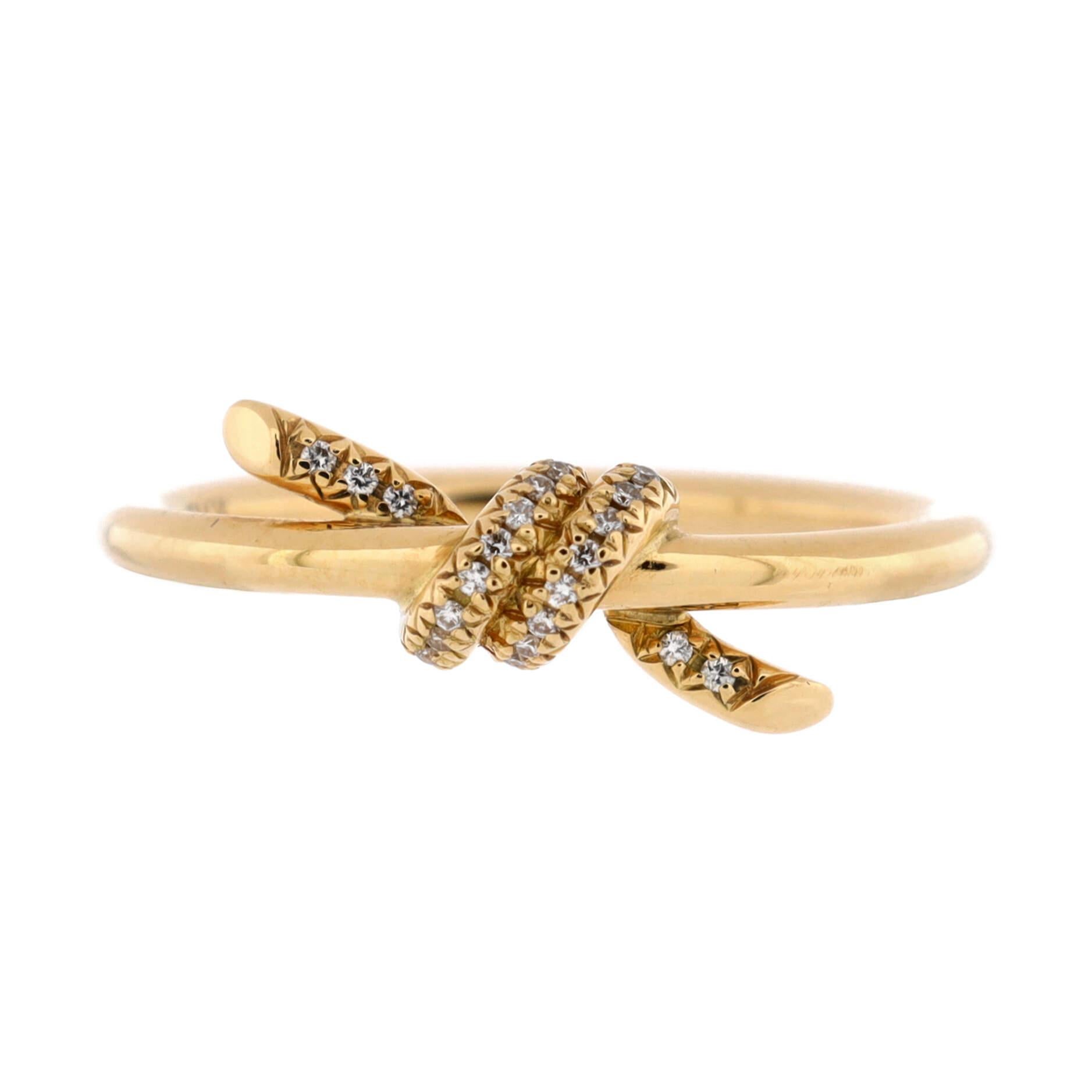 Condition: Great. Minor wear throughout.
Accessories: No Accessories
Measurements: Size: 5.5, Width: 1.80 mm
Designer: Tiffany & Co.
Model: Knot Ring 18K Yellow Gold with Diamonds
Exterior Color: Yellow Gold
Item Number: 217332/2
