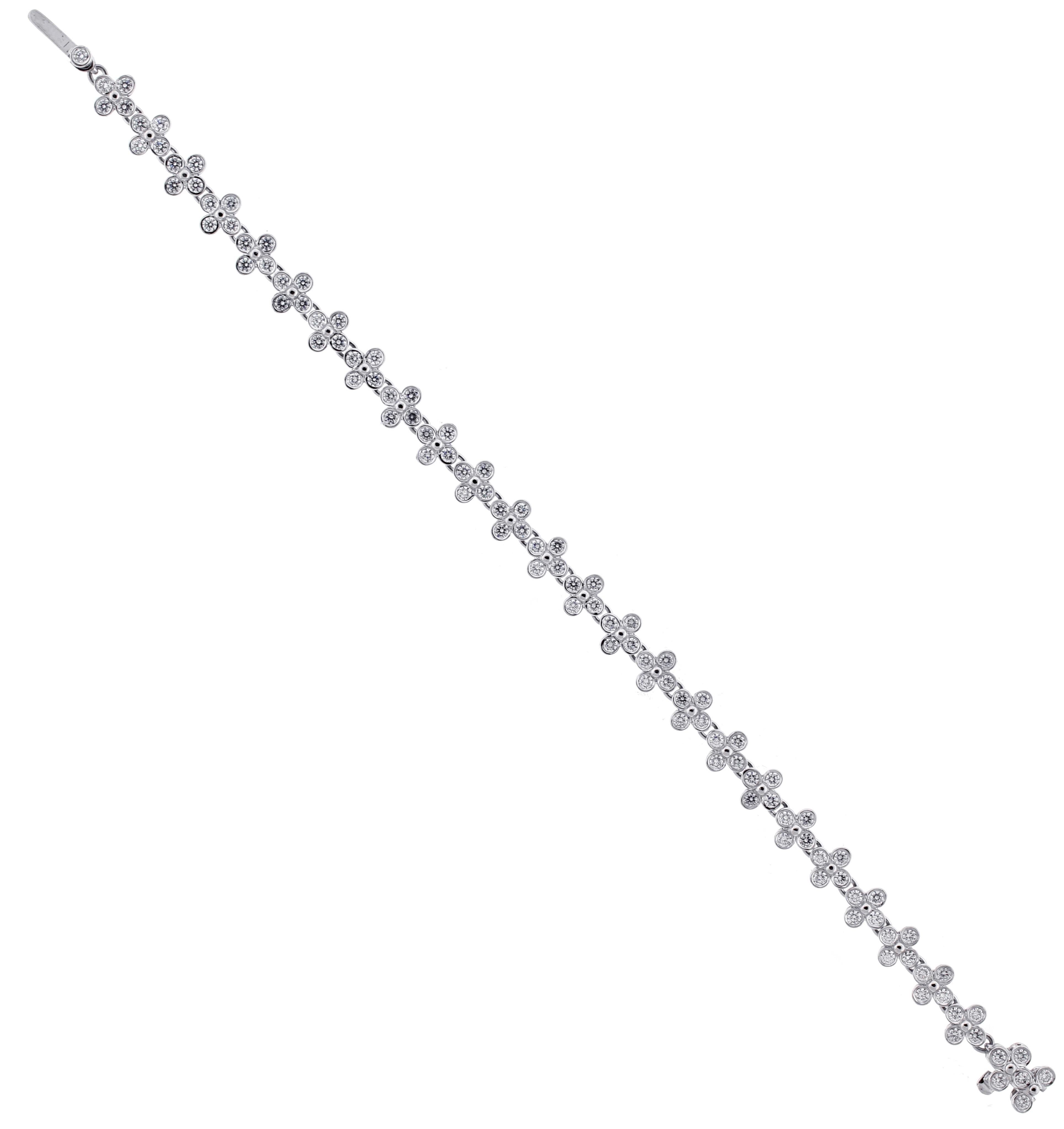 From Tiffany & Co.'s  diamond lace collection,  this wonderful platinum bracelet featuring clovers of shimmering diamonds

♦ Designer: Tiffany & Co.
♦ Metal: Platinum
♦ 21st century
♦ 6 5/8ths of and inch long 8/8ths wide
♦ 107 diamonds weigh 3.21