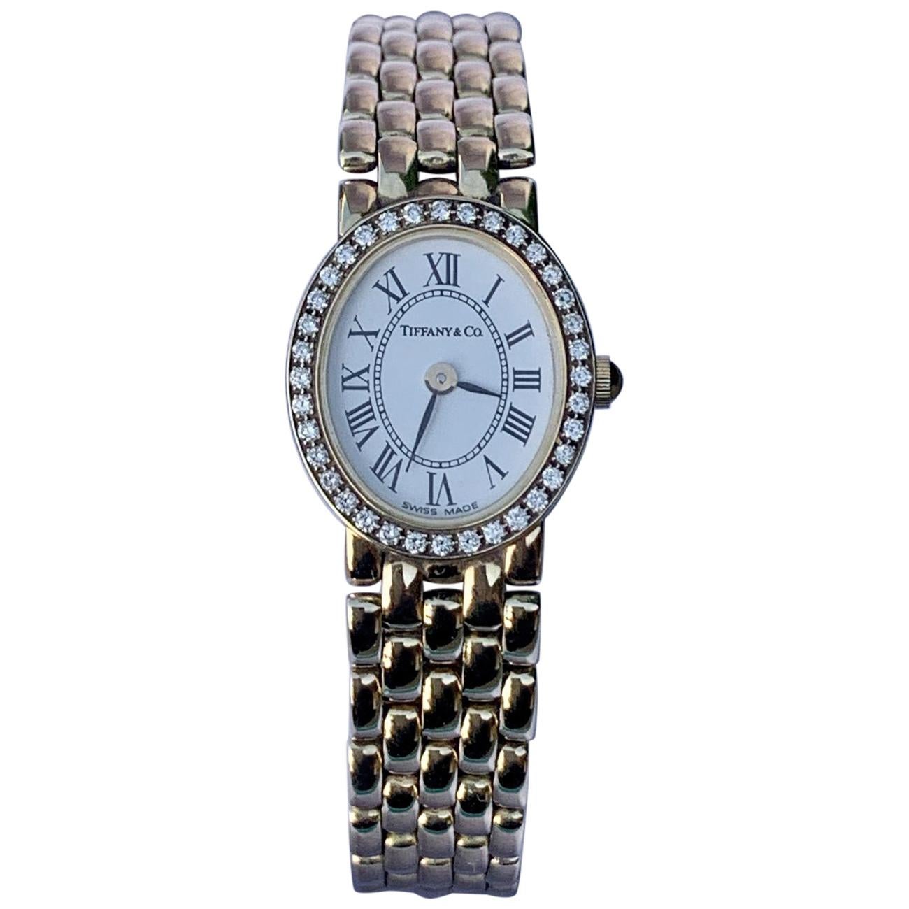Tiffany & Co Ladies 14 Karat Yellow Gold Wristwatch with Diamond Bezel