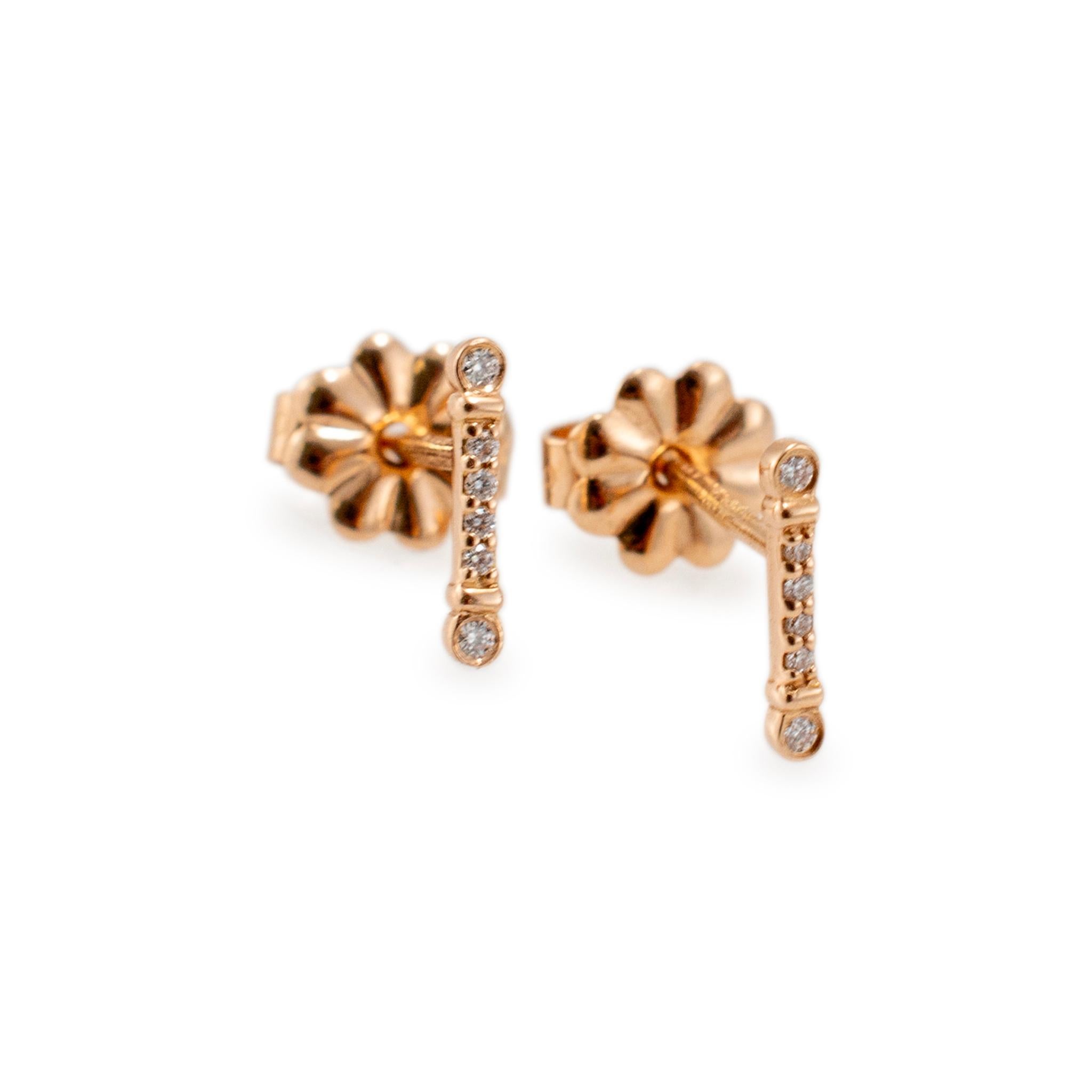 Brand: Tiffany & Co.

Gender: Ladies 

Metal Type: 18K Rose Gold

Length: 8.80 mm  

Width: 1.70 mm

Weight: 0.92 grams

One pair of ladies 18K rose gold diamond stud earrings with pushbacks. The metal was tested and determined to be 18K rose gold.