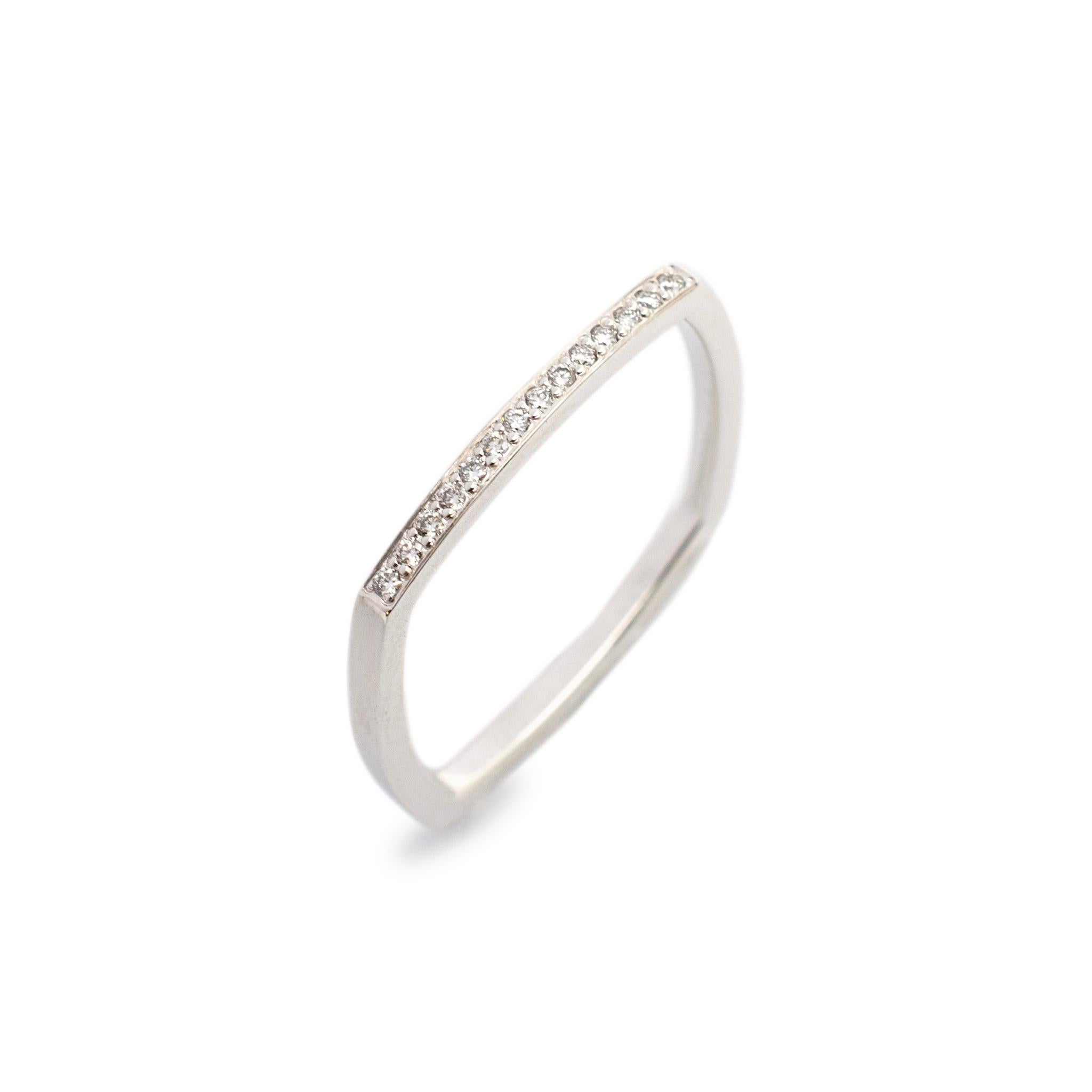 Brand: Tiffany & Co.

Gender: Ladies

Metal Type: 18K White Gold

Size: 6

Shank Width: 1.60 mm

Weight: 1.90 grams

Ladeis 18K white gold diamond wedding band with a soft-square shank. Engraved with 