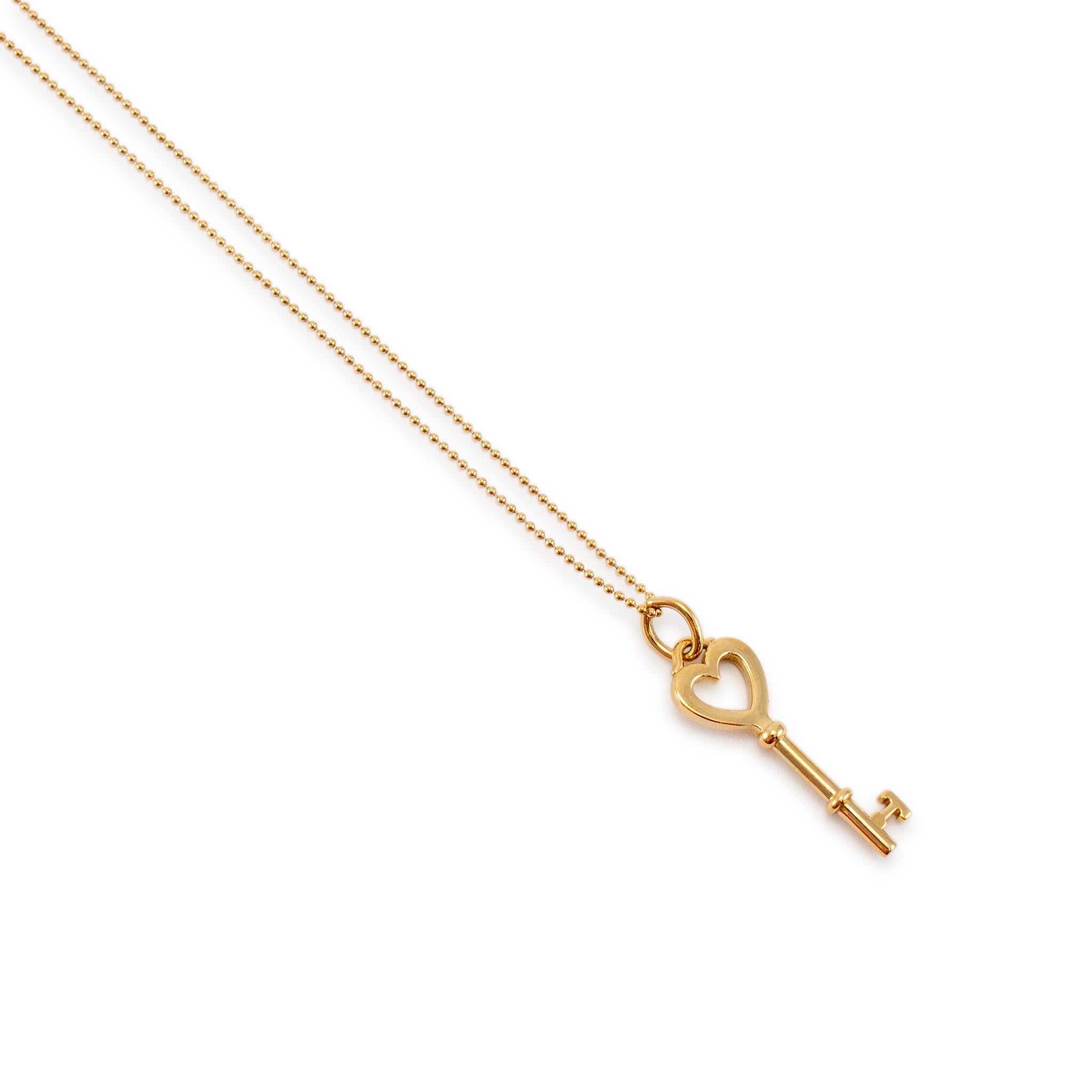 Brand: Tiffany & Co.

Gender: Ladies

Metal Type: 18K Yellow Gold 

Length: 17.00 inches 

Width: 1.00 mm

Weight: 5.00 Grams

Ladies designer made polished 18K yellow gold, bead necklace. The metal was tested and determined to be 18K yellow gold.