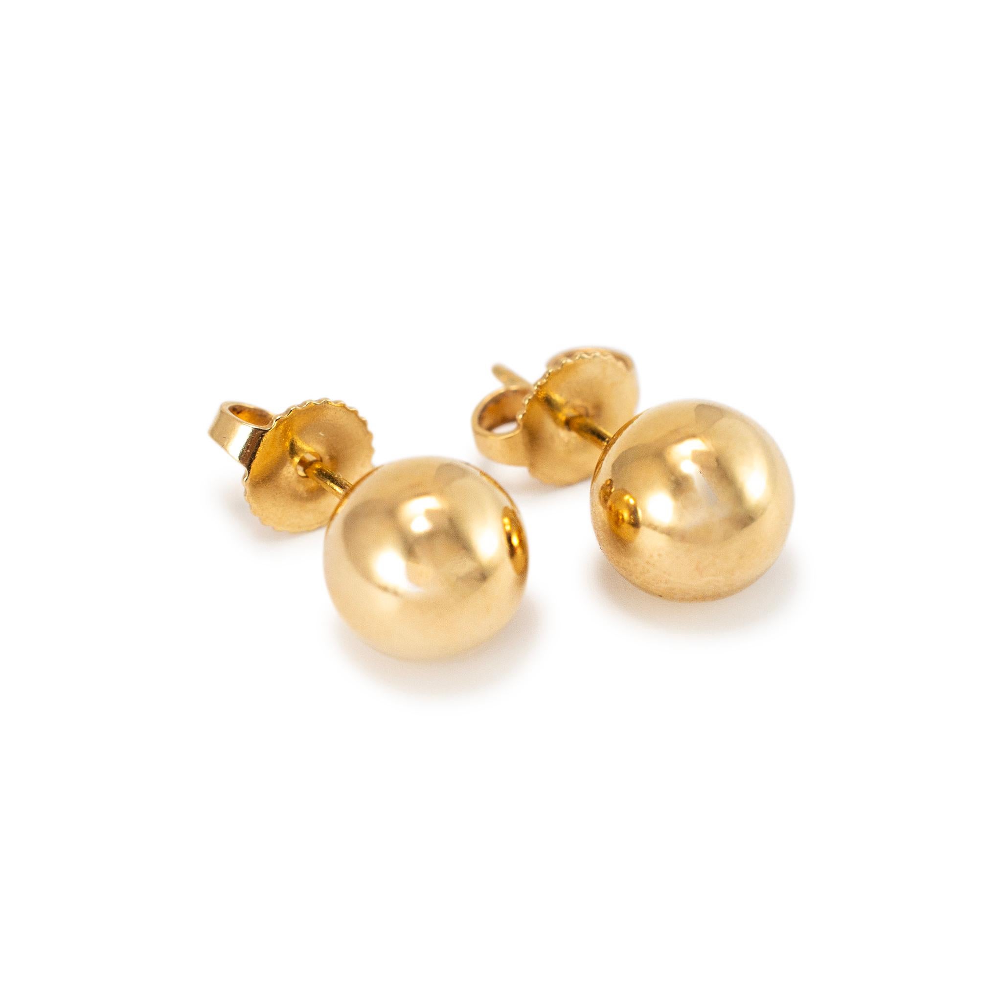 Marke: Tiffany & Co. 

Geschlecht: Damen 

Metall Typ: 18K Gelbgold

Breite: 8,00 mm

Gewicht: 3,13 Gramm 

Damen-Ohrstecker aus 18 Karat Gelbgold mit Druckknöpfen. Das Metall wurde getestet und es wurde festgestellt, dass es sich um 18 Karat