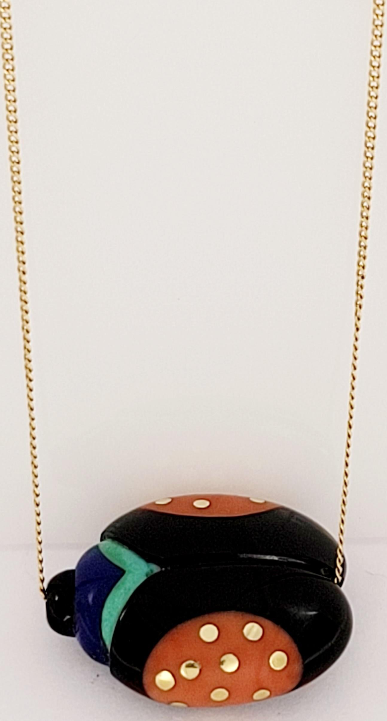 Tiffany& Co Pendant Necklace

Material 18K Yellow Gold

Design Multicolored beetle with gold dots

Chain Length 18'' Long 

Gender Women

 Pendant Chain Weight 10gr 

Condition New, never worn

Comes with original packaging

Retail Price $1200