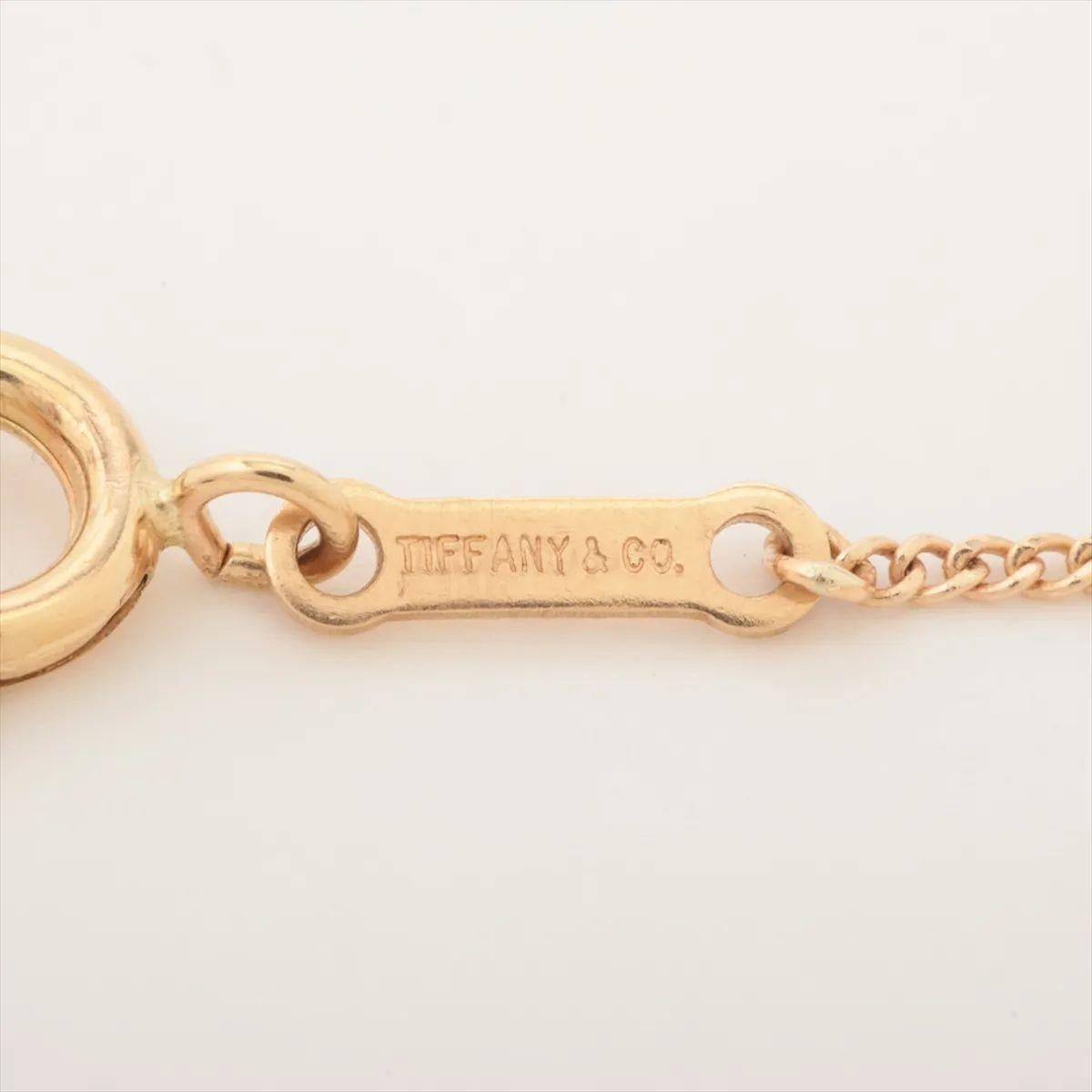 Women's Tiffany & Co. Lapis Lazuli Chain Crossover Heart Necklace Yellow Gold For Sale