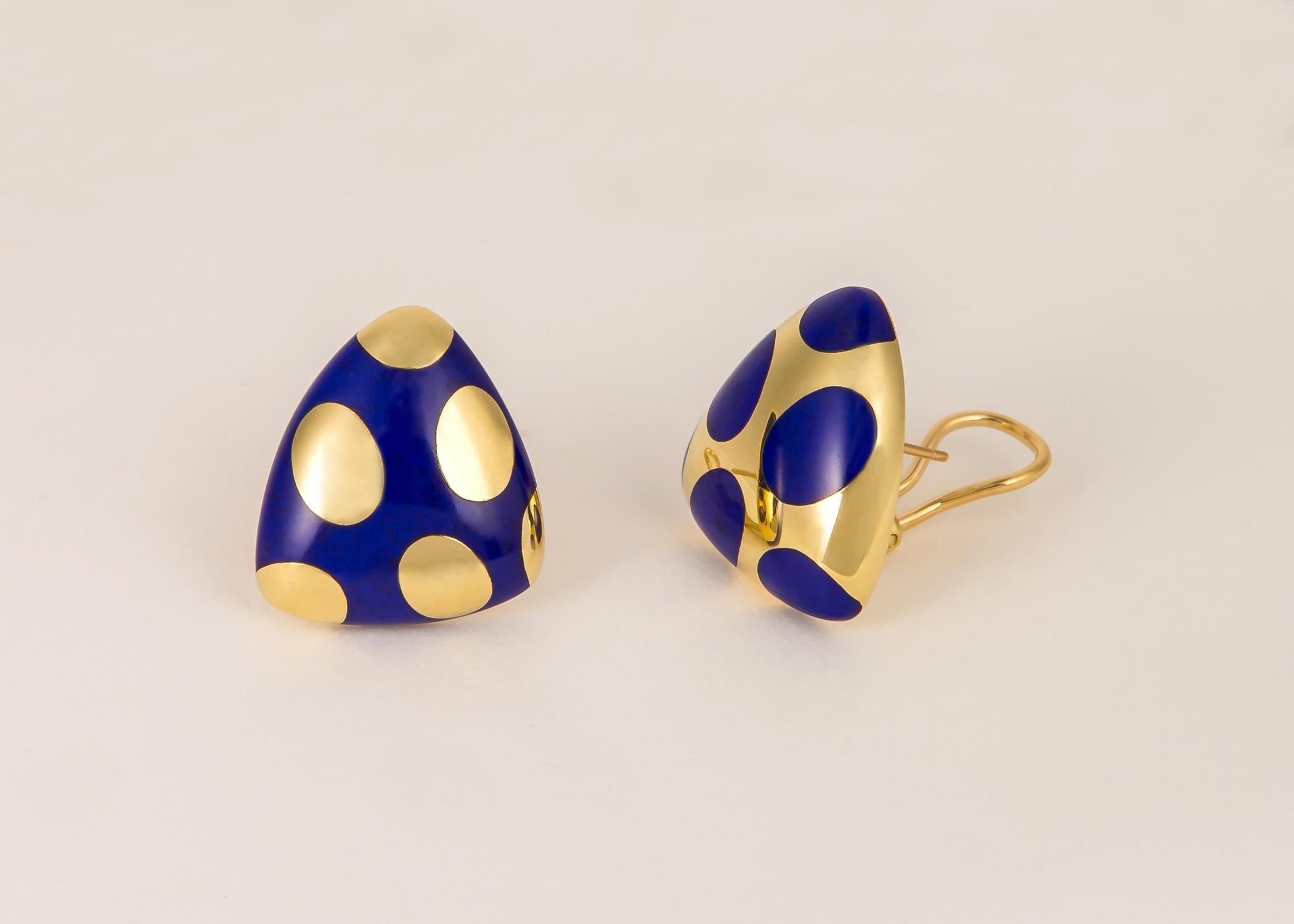 Angela Cummings designed her iconic positive negative earrings in various shapes and stones. This soft triangular shape with lapis is easy to wear and rarely available. 7/8's of an inch in size.