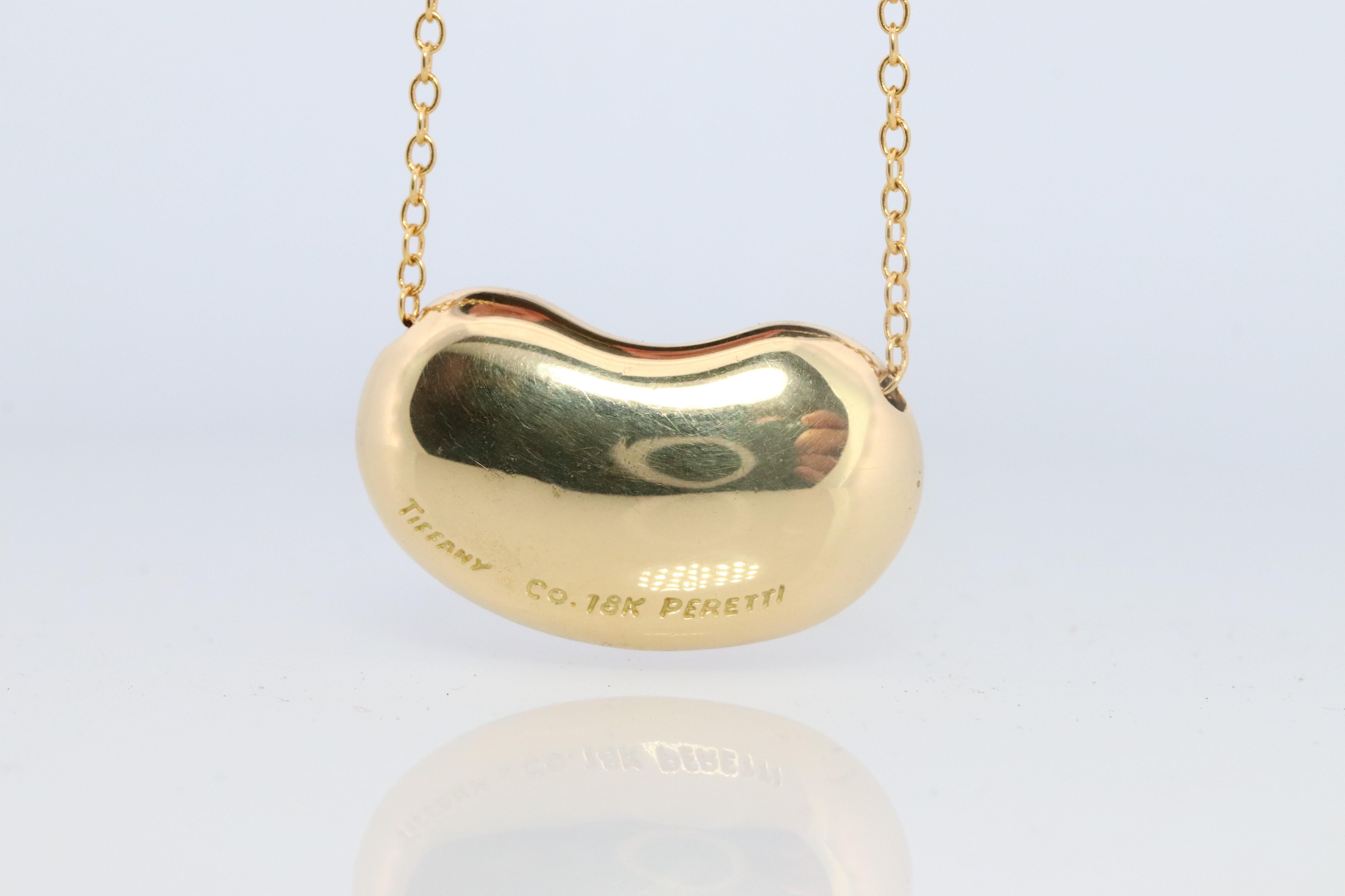 Modern Tiffany & Co. Large Bean Pendant Necklace. 750 Yellow Gold Tiffany Long Chain. For Sale
