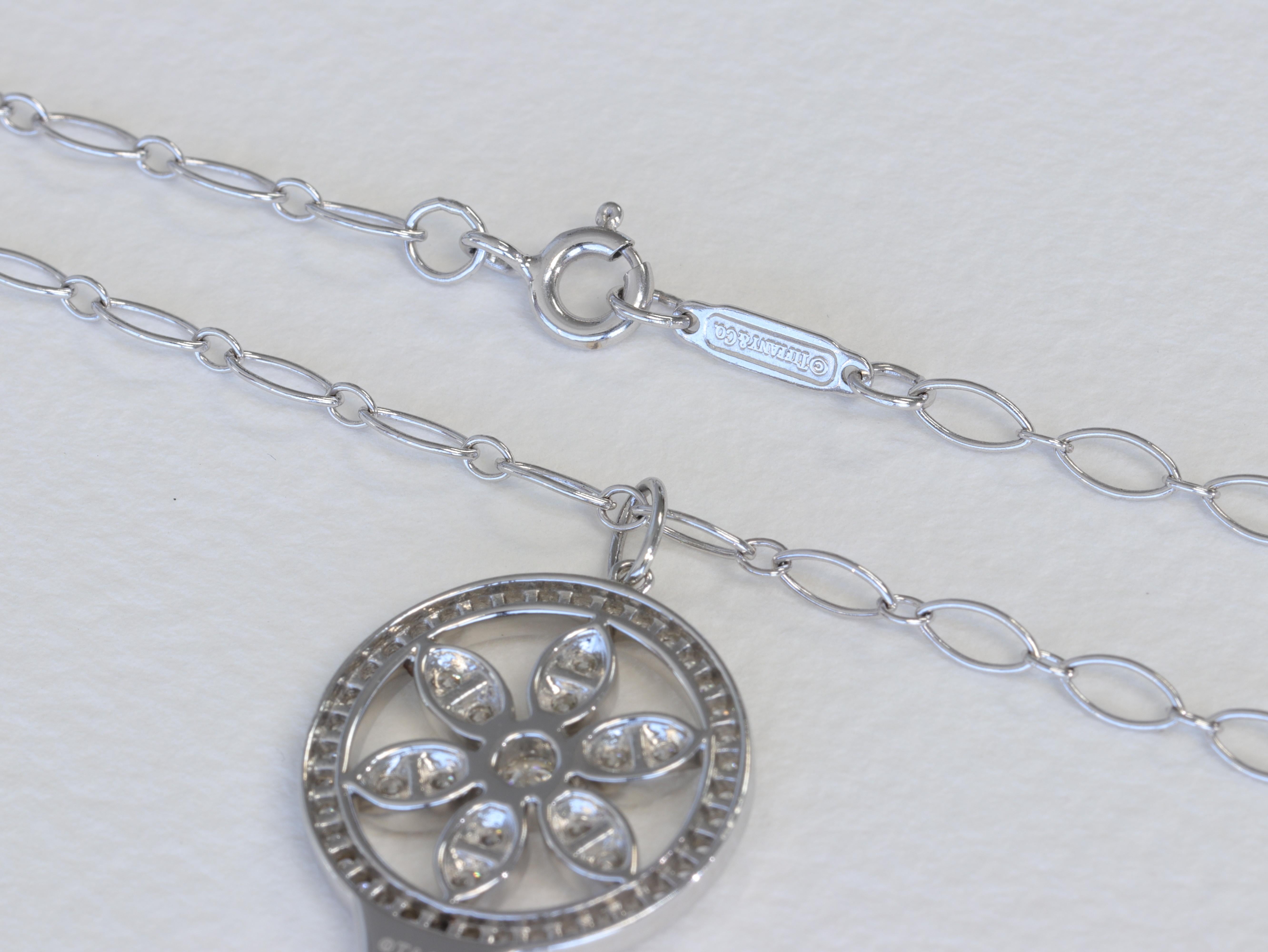 Modern Tiffany & Co. Large Daisy Diamond & Platinum Key Pendant Long Oval Link Chain