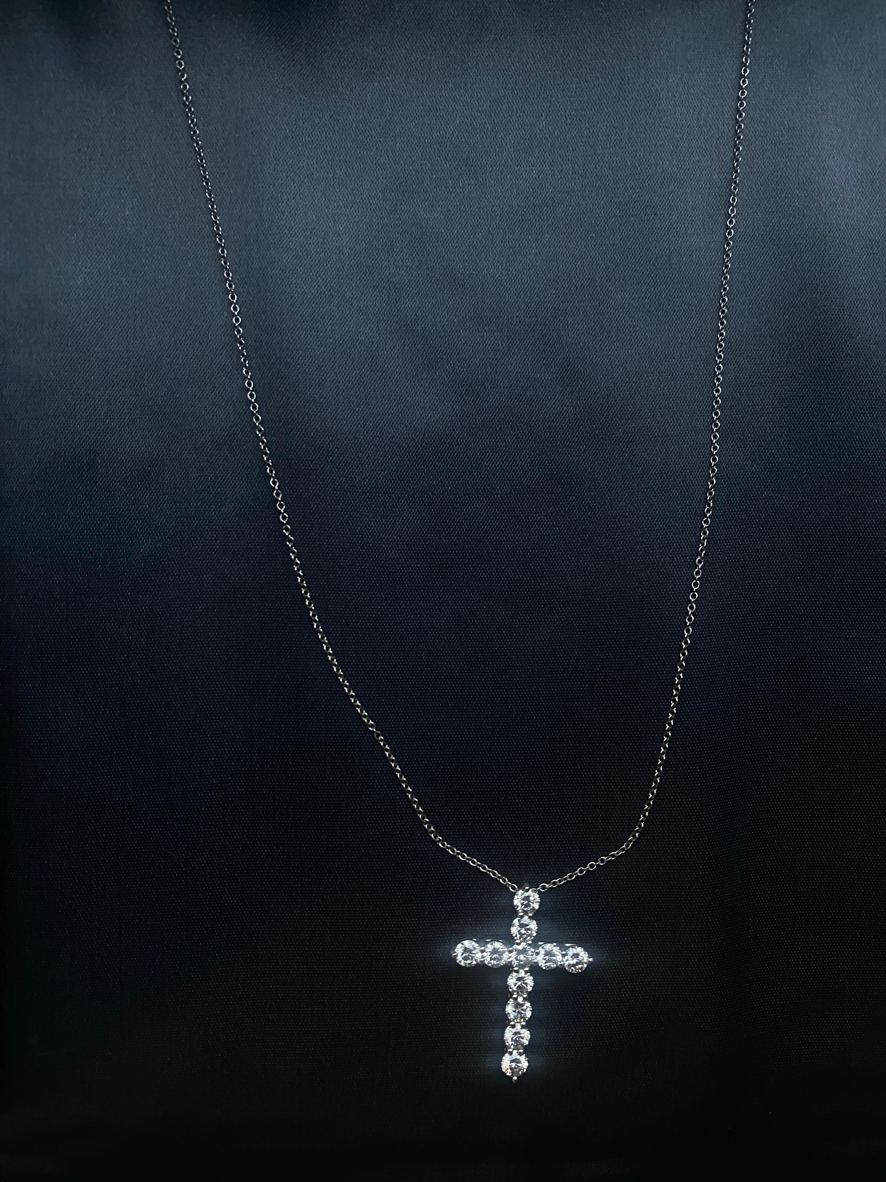 Tiffany Co Large Diamond Cross 
16 inches long platinum chain 
Carat weight: 1.71
Condition: excellent, was polished at Tiffany recently ( receipt provided) 
Comes with: inner tiffany blue leather box, outer box 

Buy preowned luxury goods at Golden