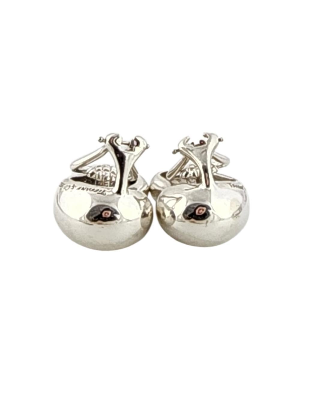 Tiffany 
Co. Large Elsa Peretti Sterling Silver Bean Clip-on Earrings

Sleek and iconic, These Tiffany sterling silver bean earrings embody Elsa Peretti's signature organic elegance. Their smooth, sculptural form offers timeless simplicity and