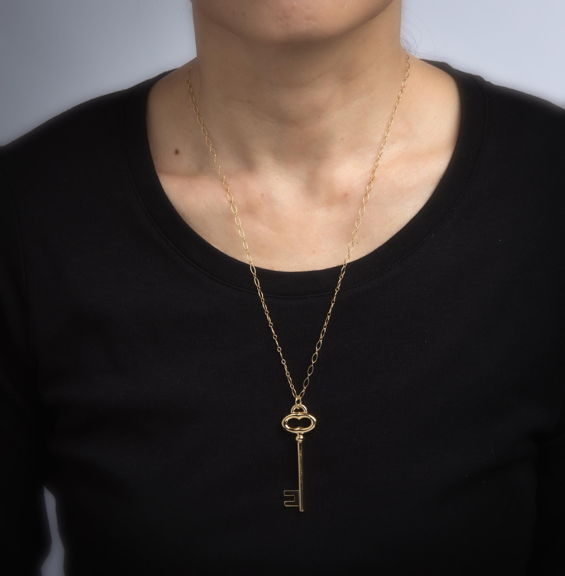 18k gold key pendant