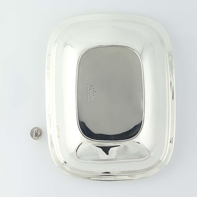 Item: Serving Bowl / Tray
Brand: Tiffany & Co
Monogram: No
Stamps: Tiffany & Co Makers Sterling Silver 22490 M
Metal Content: Sterling Silver
Measurements: 9