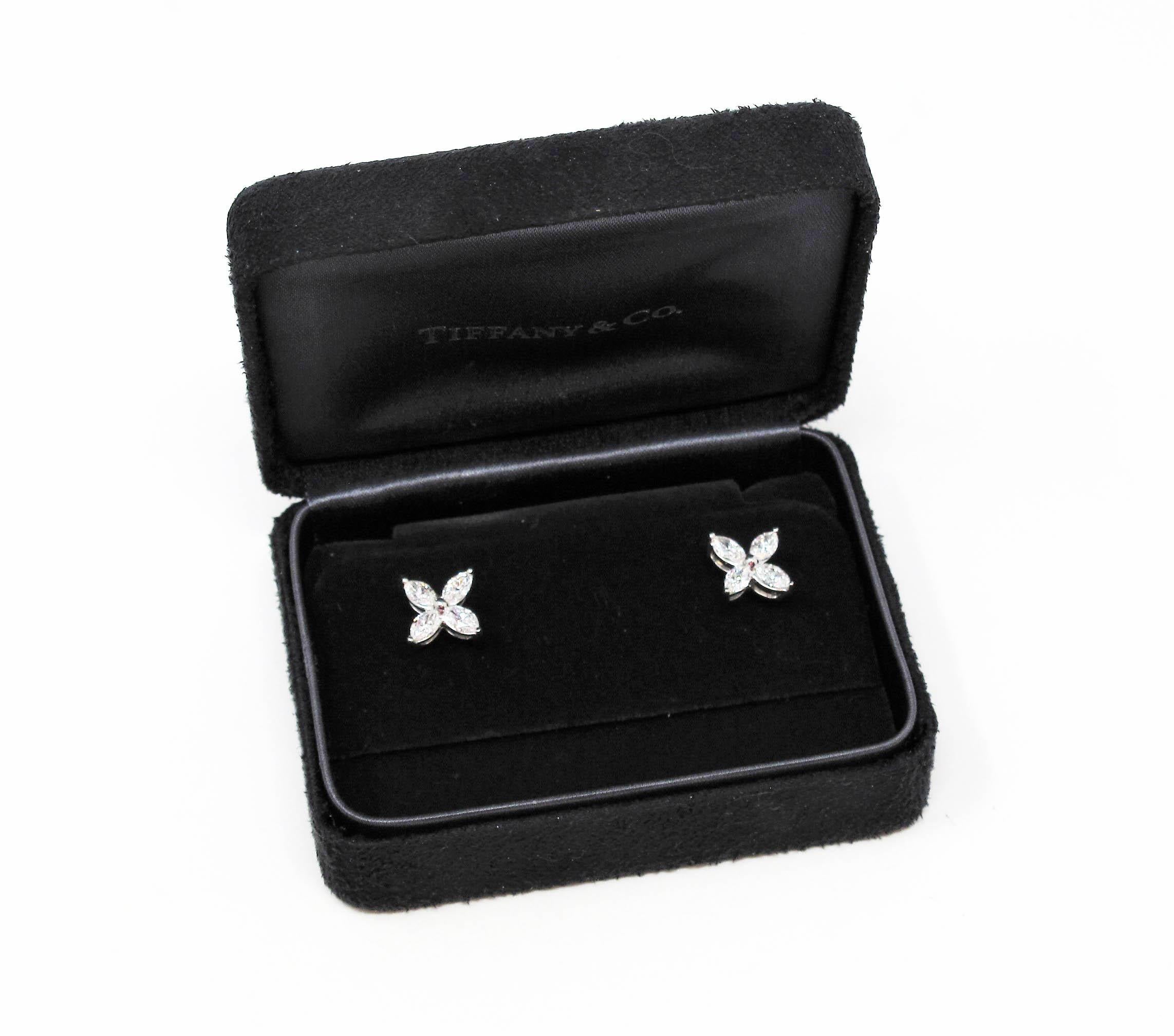 These brilliant marquise diamond and platinum earrings are absolutely bursting with sparkle! Part of the Tiffany & Co. Victoria Collection, these incredible stud earrings are the epitome of modern elegance. The gorgeous 4 pronged design fills the