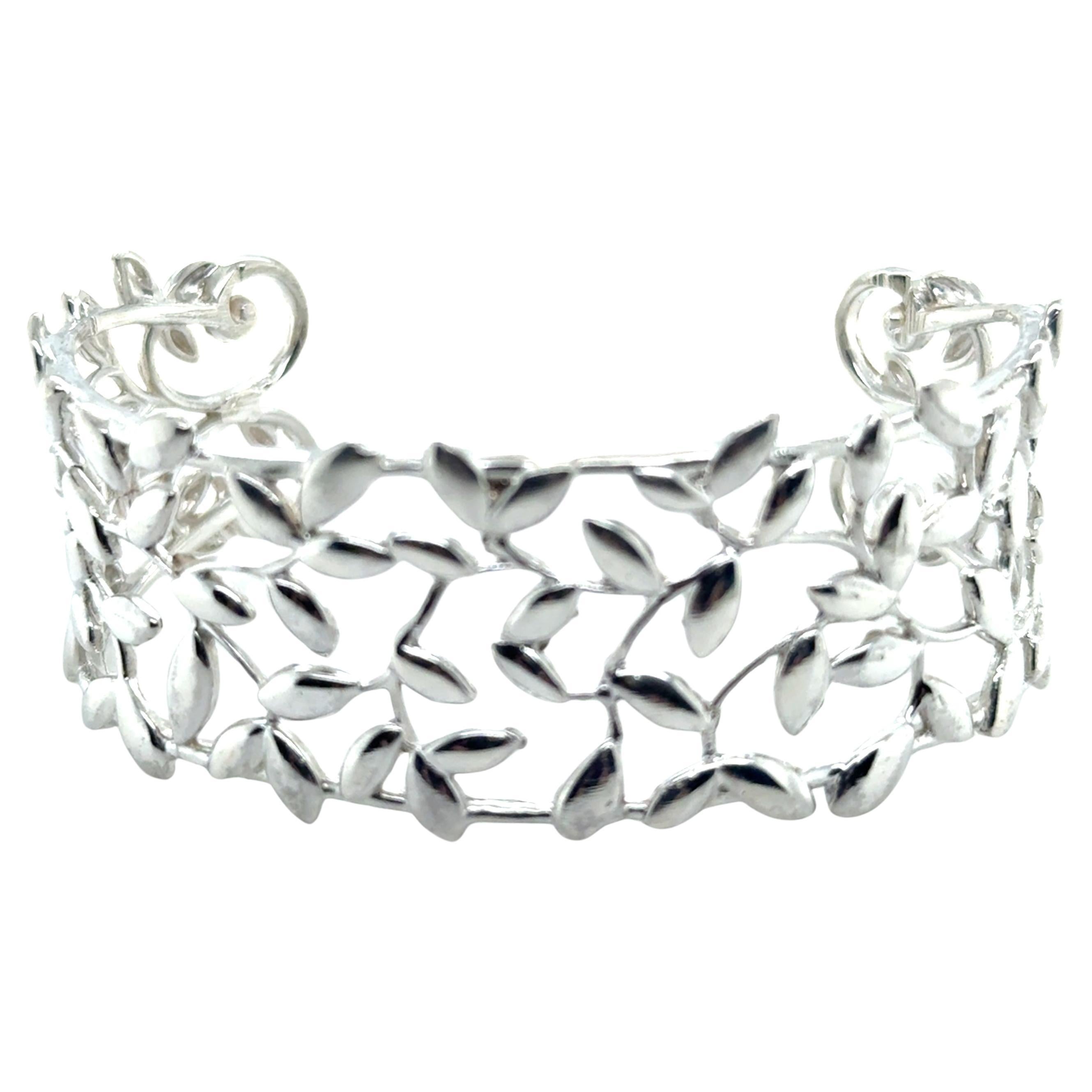 Who designed the Tiffany bone cuff?