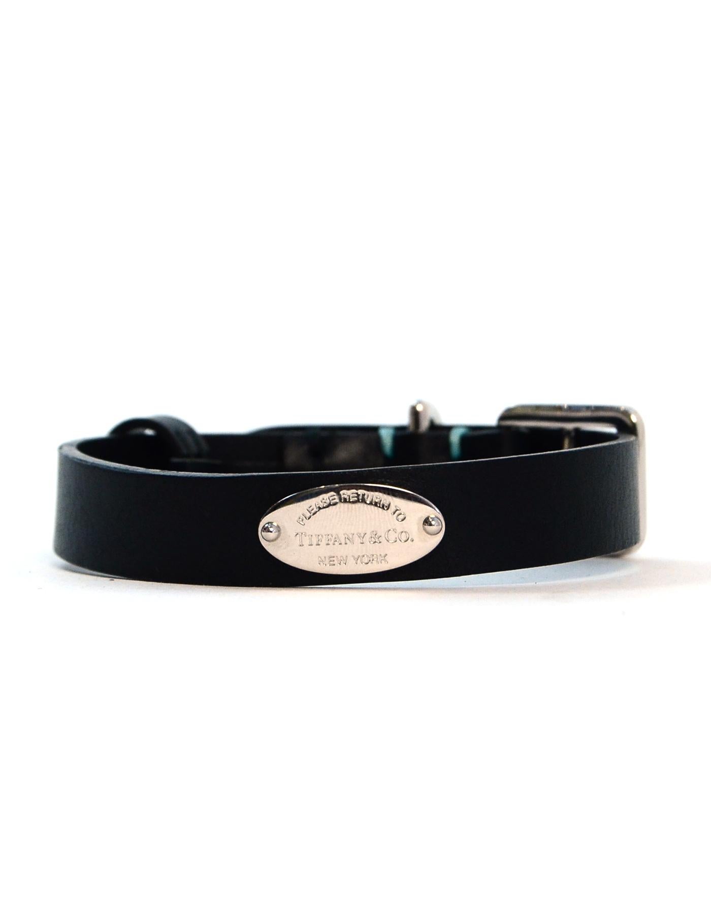 Tiffany & Co. Leather/Palladium Small Dog Collar 
Made In: Italy
Color: Black
Materials: Leather, palladium
Hallmarks: NY T&CO 1837
Closure/Opening: Front buclkle closure
Overall Condition: Excellent pre-owned condition
Estimated Retail: $235 +