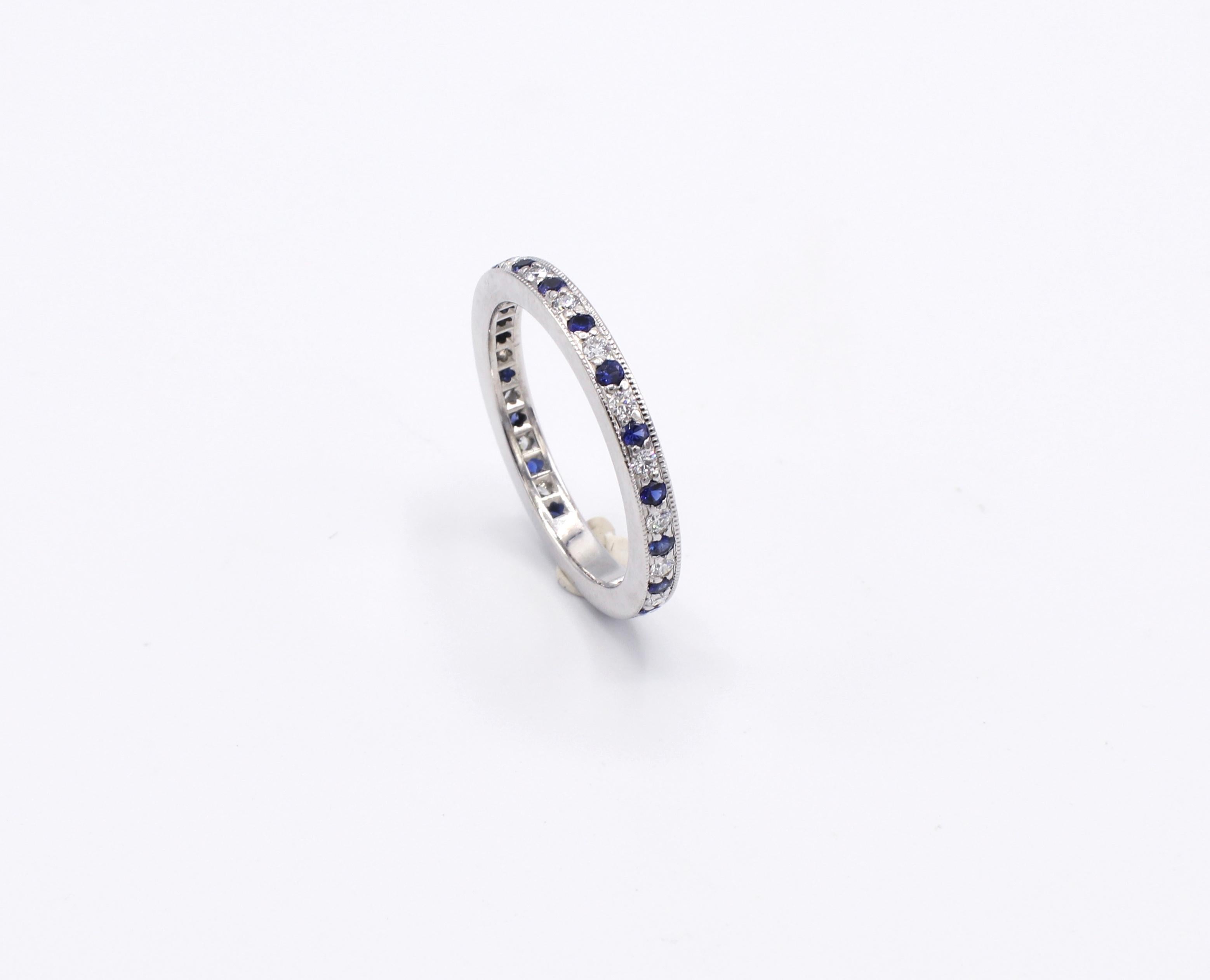 Tiffany & Co. Legacy Collection Platinum Diamond & Sapphire Band Ring Size 5.5 

Metal: Platinum
Weight: 3.95 grams
Diamonds: Approx. .20 CTW G VS
Width: 2mm 
Size: 5.5 (US) 
Box included as shown 

Retail: $3,300 

