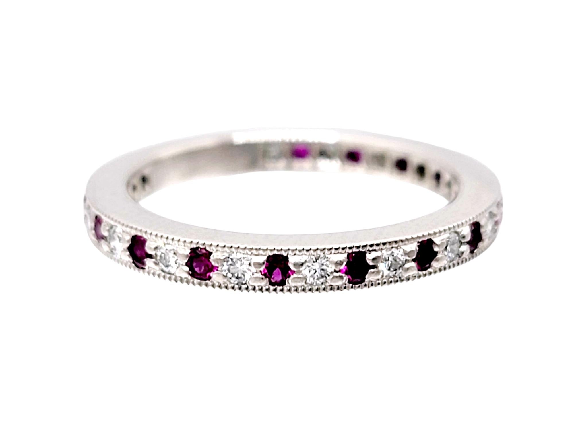 Ring size: 4.25

Stunning Tiffany & Co. Legacy Collection ruby and diamond eternity band ring. This timeless beauty features deep red rubies and icy white diamonds bead set in an alternating pattern throughout the piece. The thin, milgrain edged