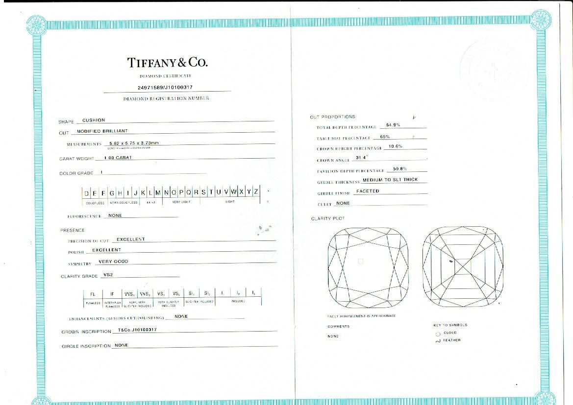 Tiffany & Co. Legacy Bague de fiançailles en platine avec diamant coussin de 1,33 carat et halo de diamants en vente 7