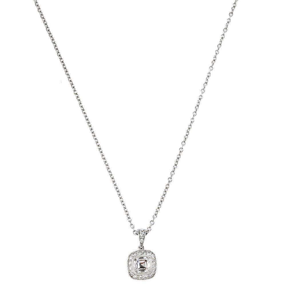This Tiffany & Co. Legacy necklace has been designed from precious platinum and comes with a rounded 0.32 CTS diamond embedded pendant on it. It is secured with a lobster clasp closure and we think it can be effortlessly be styled with both formal